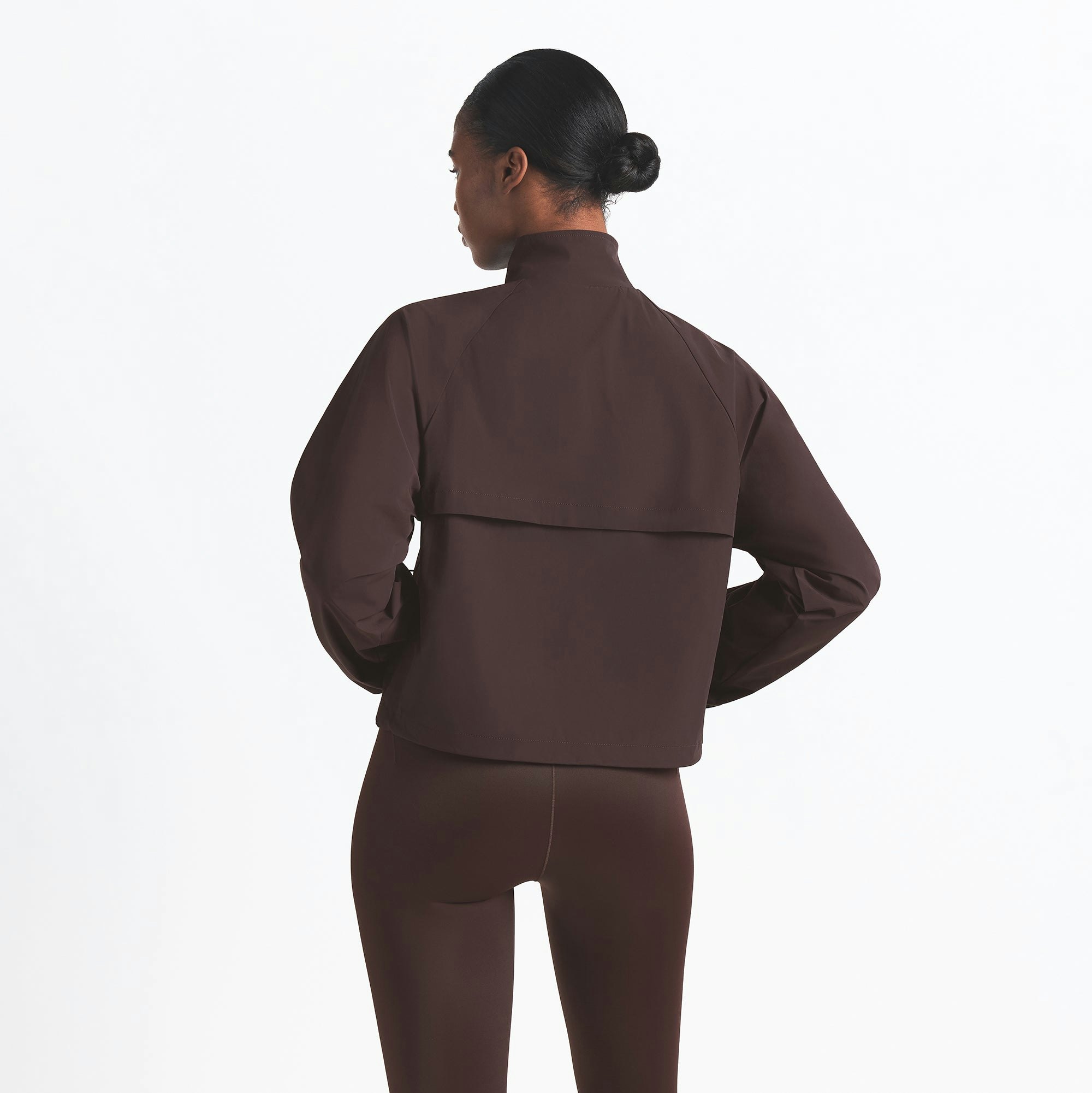 NikeSKIMS WOVEN NYLON HALF ZIP JACKET | PHOENIX ON A MODEL BACK VIEW @ | FOCUS: 0.0, 1.0, 0.9