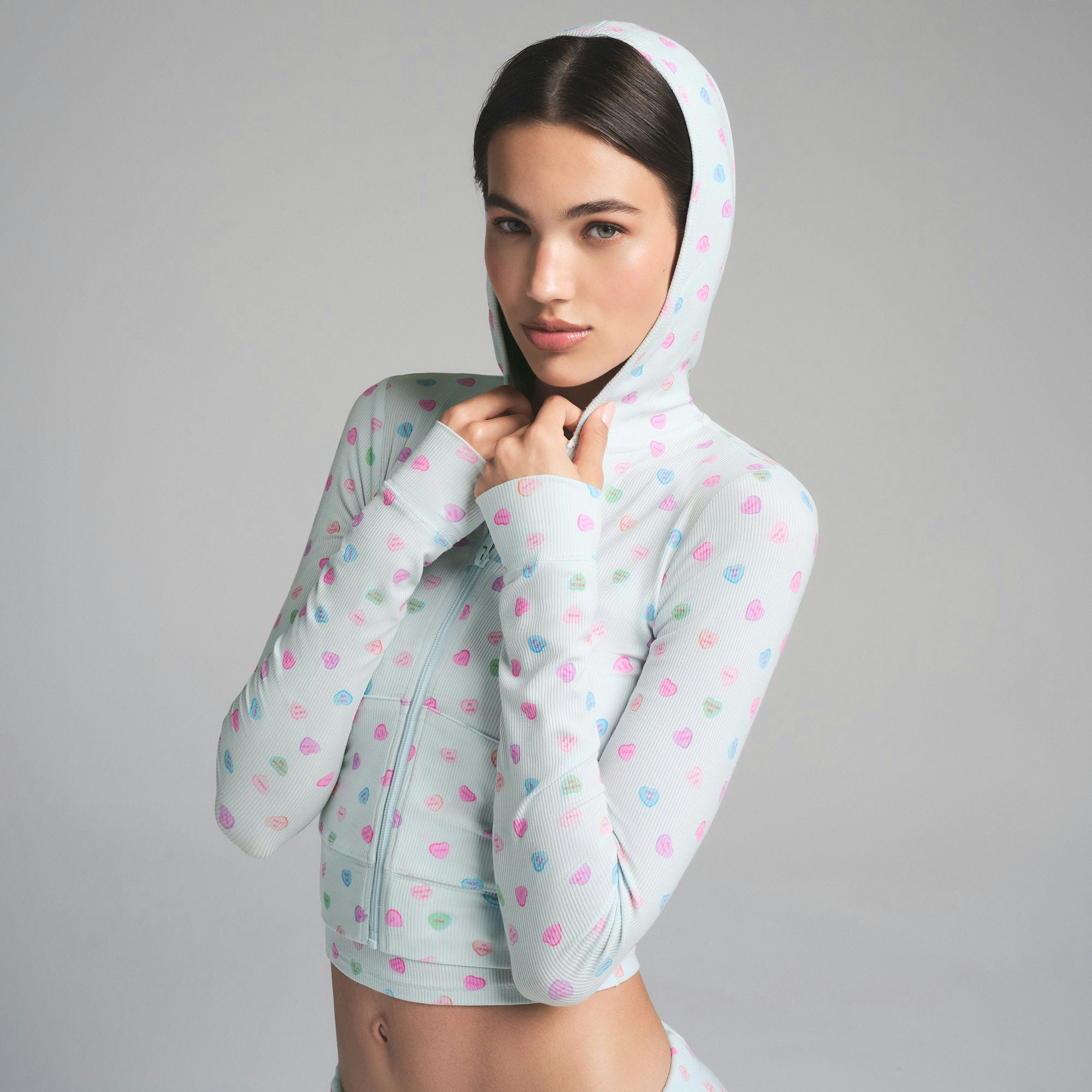 SOFT LOUNGE ZIP UP HOODIE | CLOUD CANDY HEART PRINT ON A MODEL SIDE VIEW | FOCUS: 0.0, 1.0, 0.9