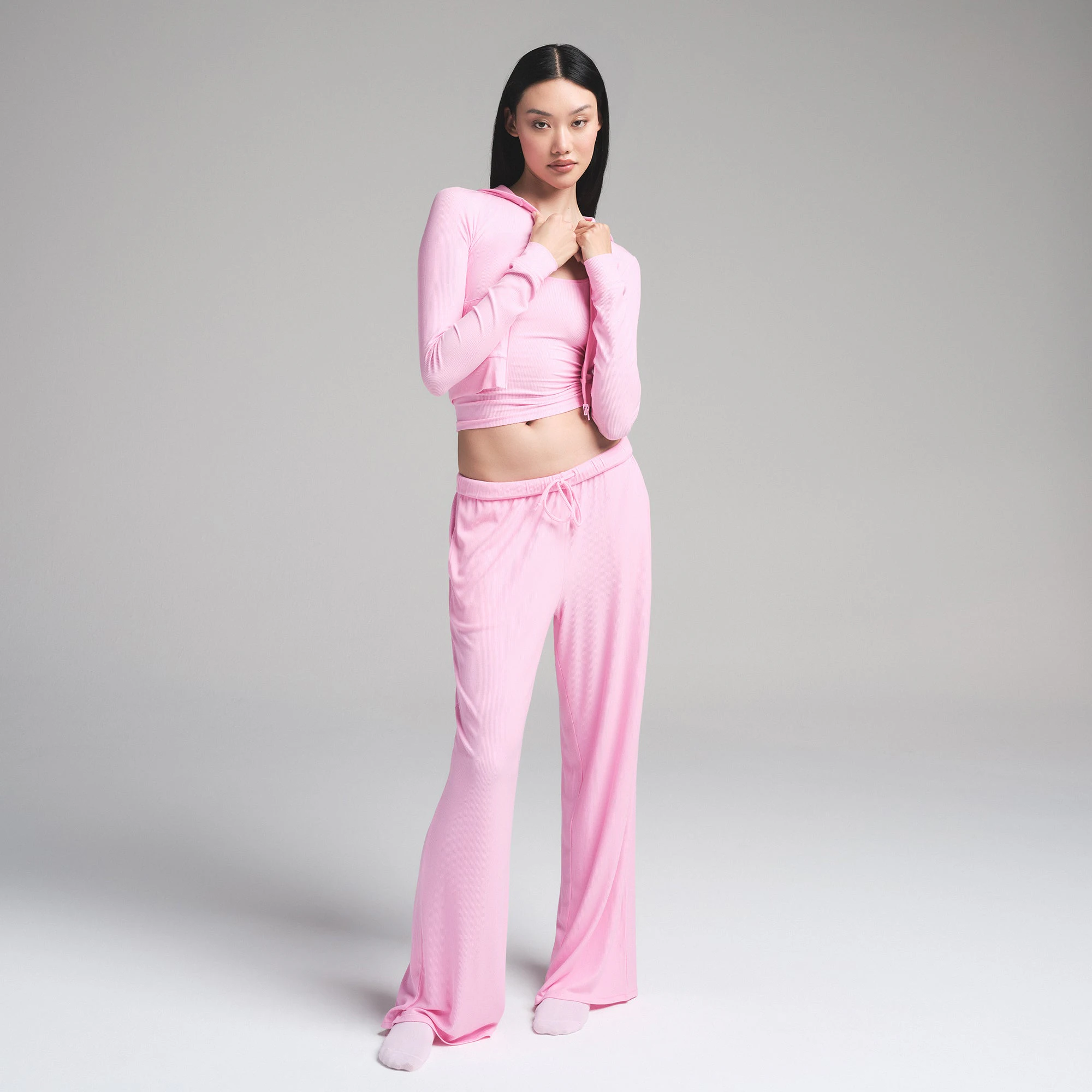 SOFT LOUNGE ZIP UP HOODIE | BUBBLE GUM ON A MODEL FRONT VIEW | FOCUS: 0.0, 1.0, 0.9