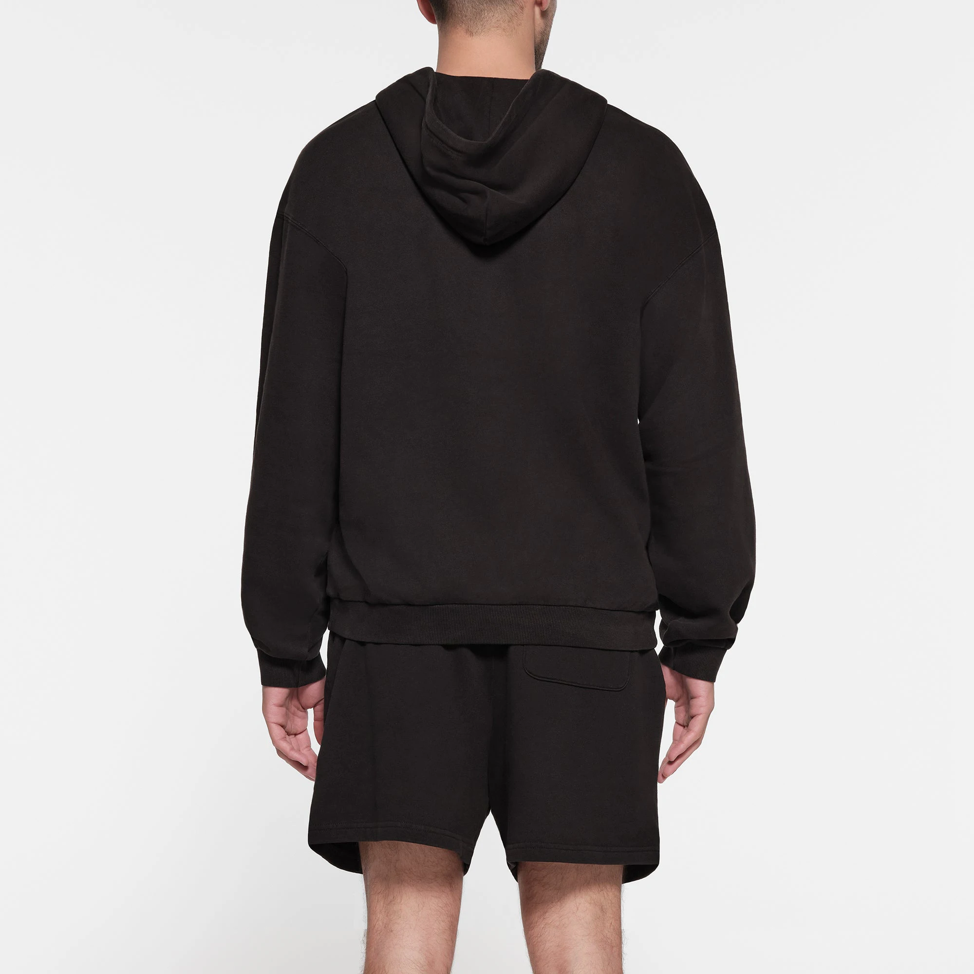 TERRY FLEECE MENS RELAXED ZIP UP HOODIE | WASHED OBSIDIAN ON A MODEL BACK VIEW