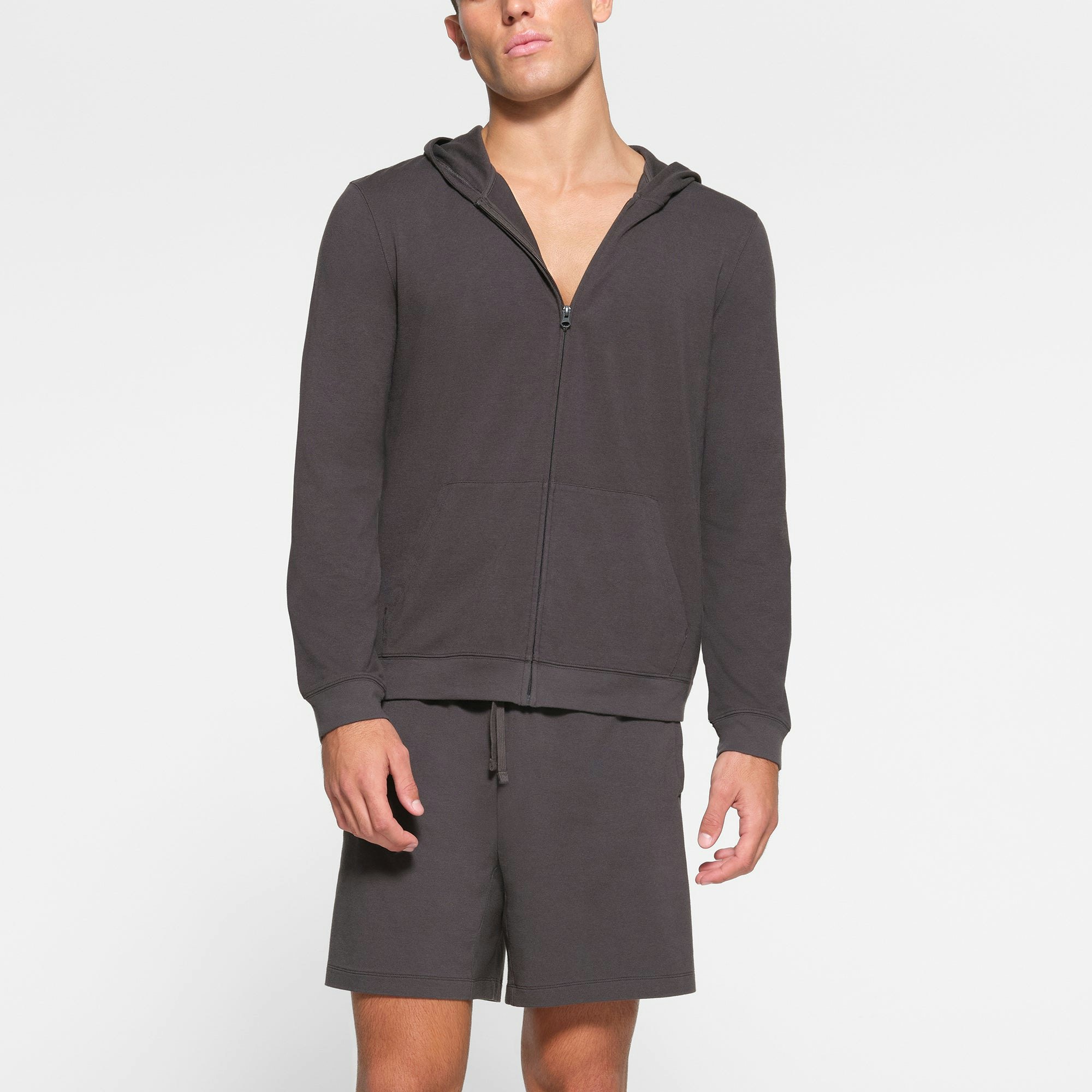 LOUNGE JERSEY MENS ZIP UP HOODIE | ASH ON A MODEL FRONT VIEW