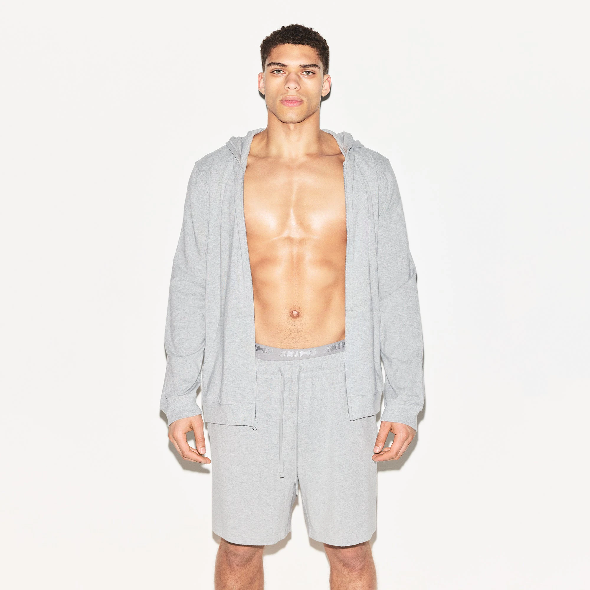 JERSEY LOUNGE MENS ZIP UP HOODIE | HEATHER GREY ON A MODEL FRONT VIEW | FOCUS: 0.0, 1.0, 0.9