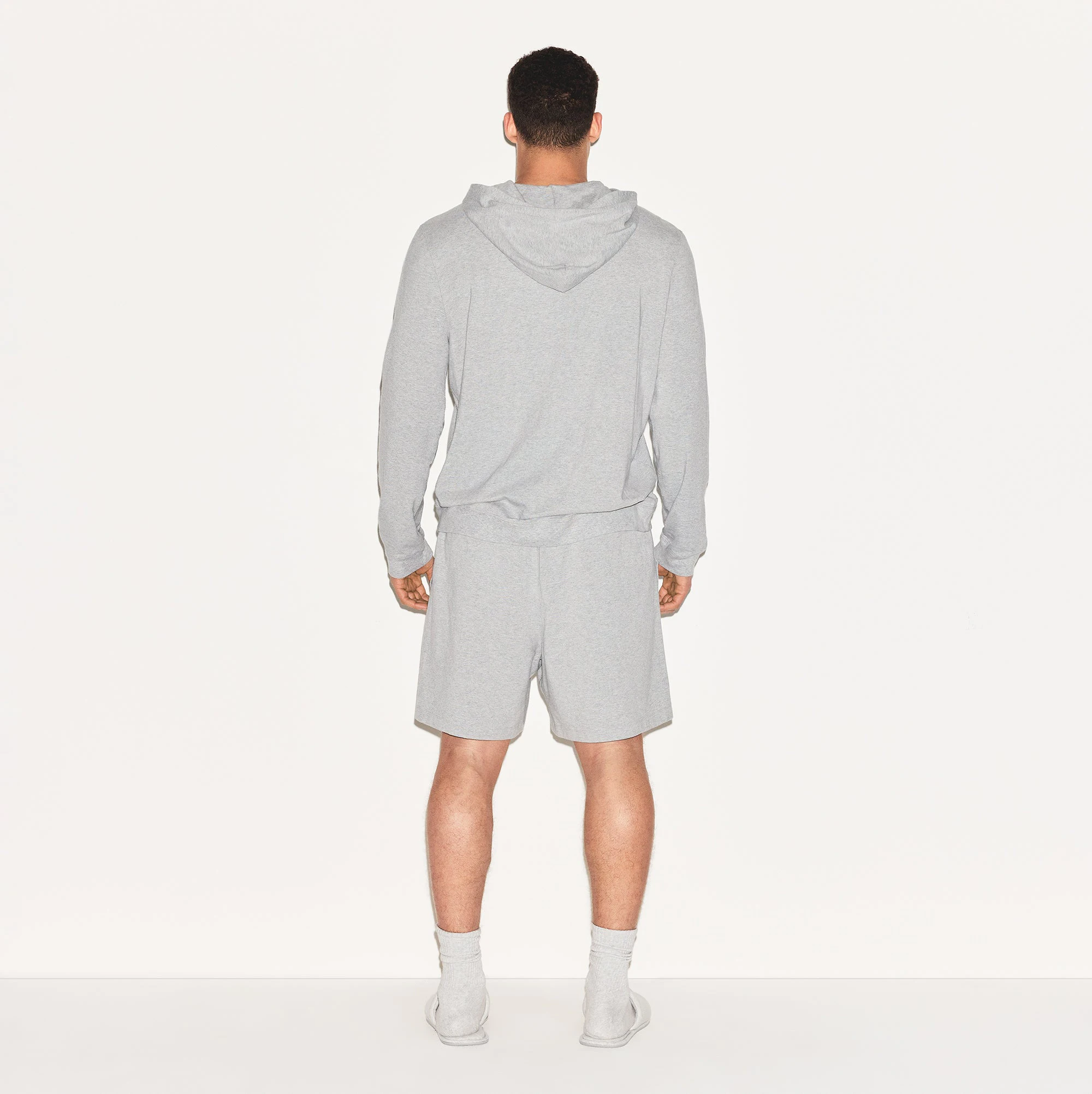 JERSEY LOUNGE MENS ZIP UP HOODIE | HEATHER GREY ON A MODEL BACK VIEW | FOCUS: 0.0, 1.0, 0.9