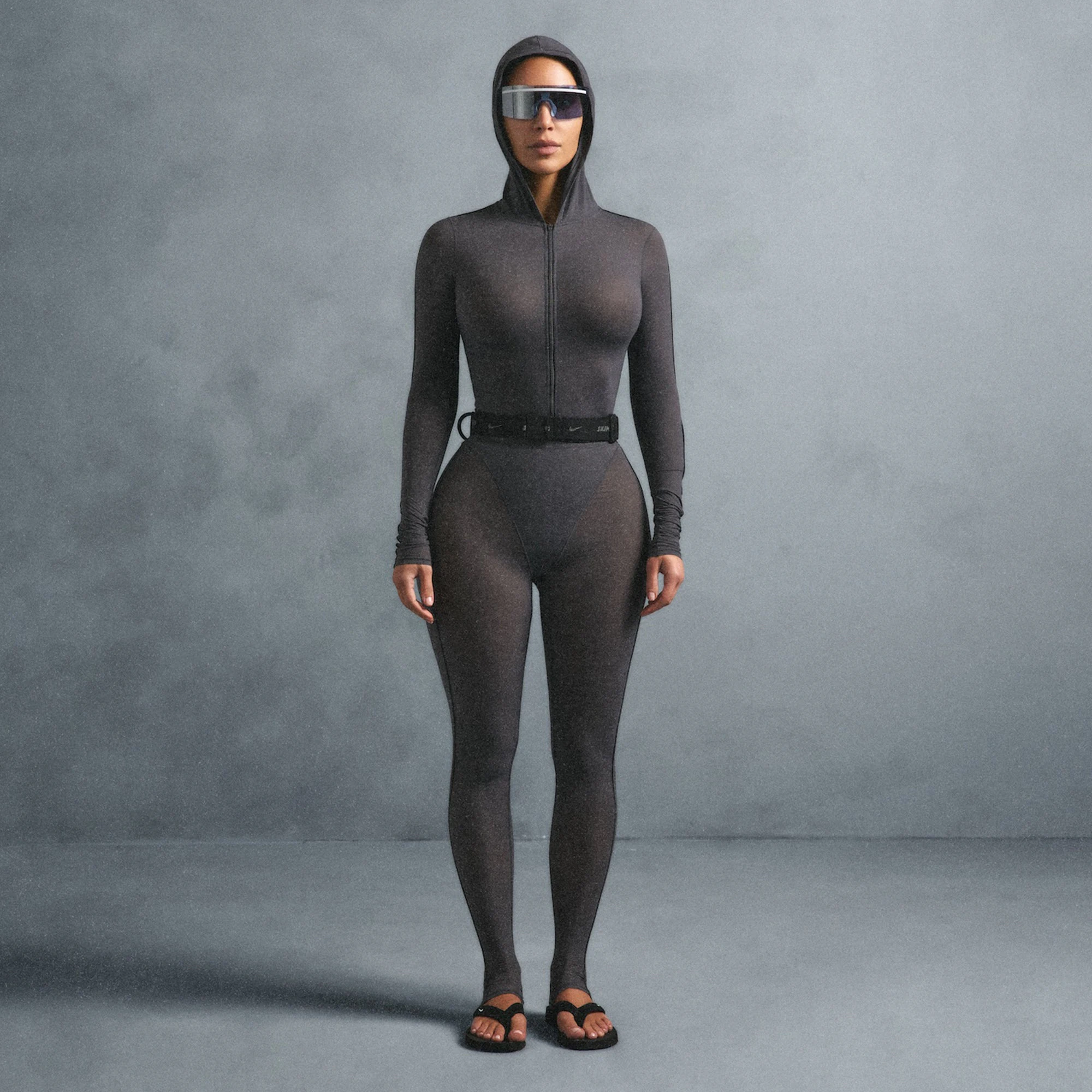 NikeSKIMS WEIGHTLESS LAYERS ZIP UP HOODIE | LEAD ON A MODEL SIDE VIEW @ | FOCUS: 0.0, 1.0, 0.9