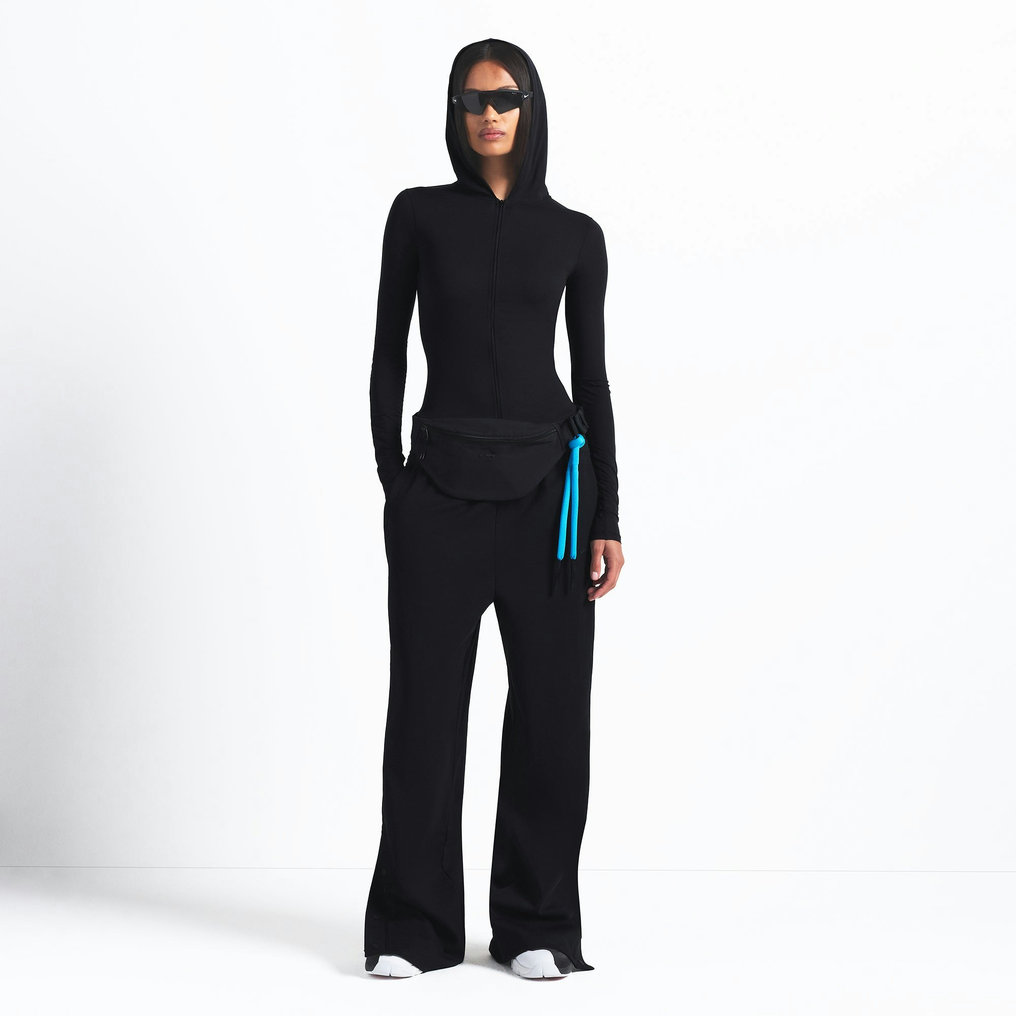 NikeSKIMS WEIGHTLESS LAYERS ZIP UP HOODIE | OBSIDIAN ON A MODEL FRONT VIEW @ | FOCUS: 0.9, 0.1, 0.7