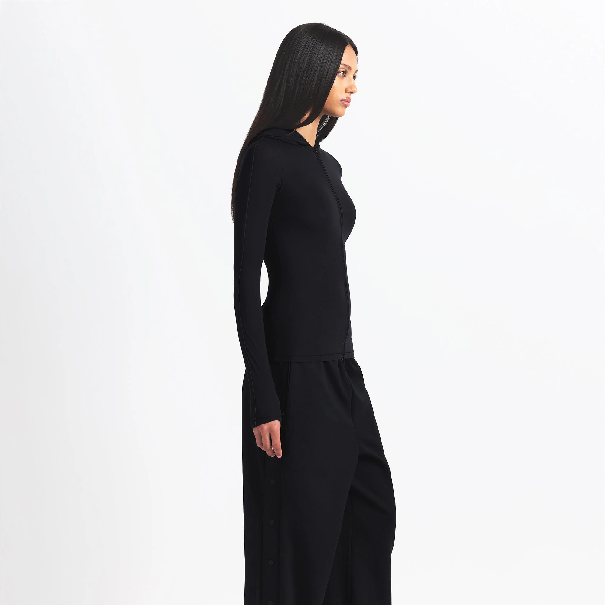 NikeSKIMS WEIGHTLESS LAYERS ZIP UP HOODIE | OBSIDIAN ON A MODEL SIDE VIEW