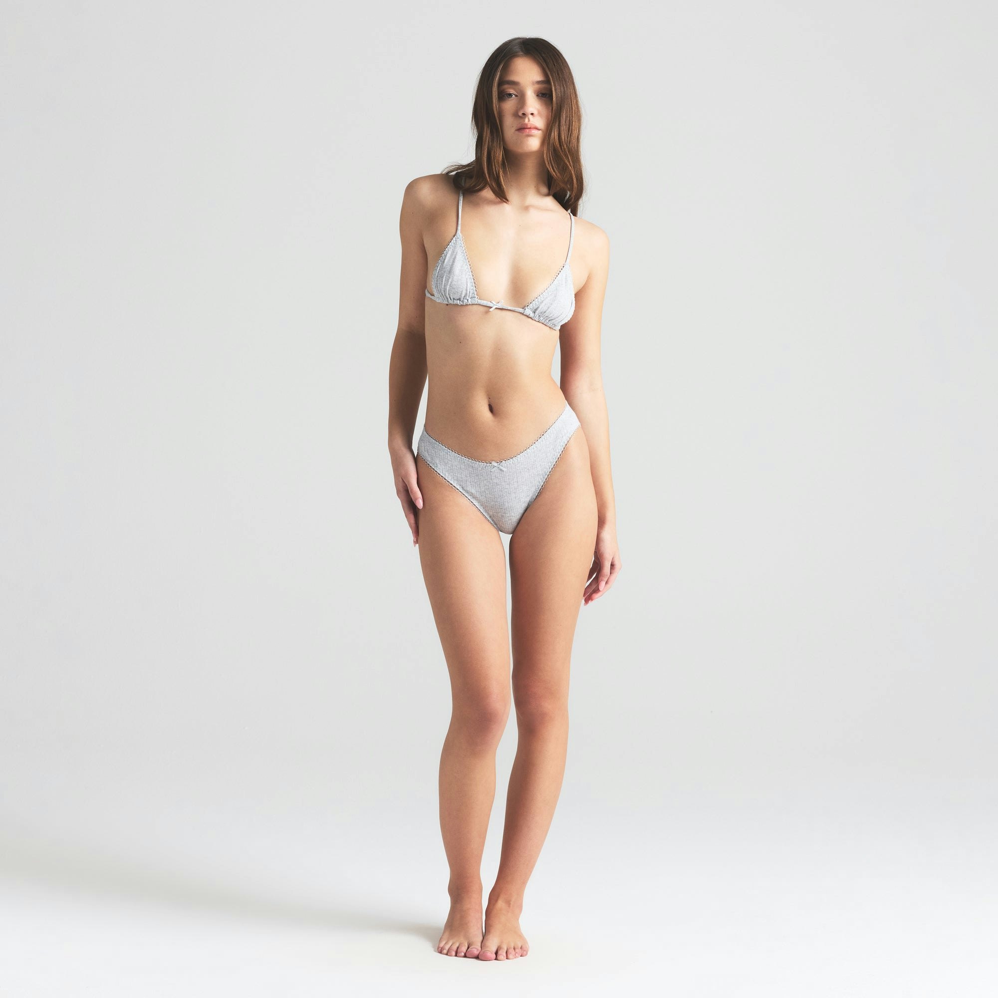POINTELLE TRIANGLE BRALETTE | LIGHT HEATHER GREY ON A MODEL FRONT VIEW | FOCUS: 0.0, 1.0, 0.9