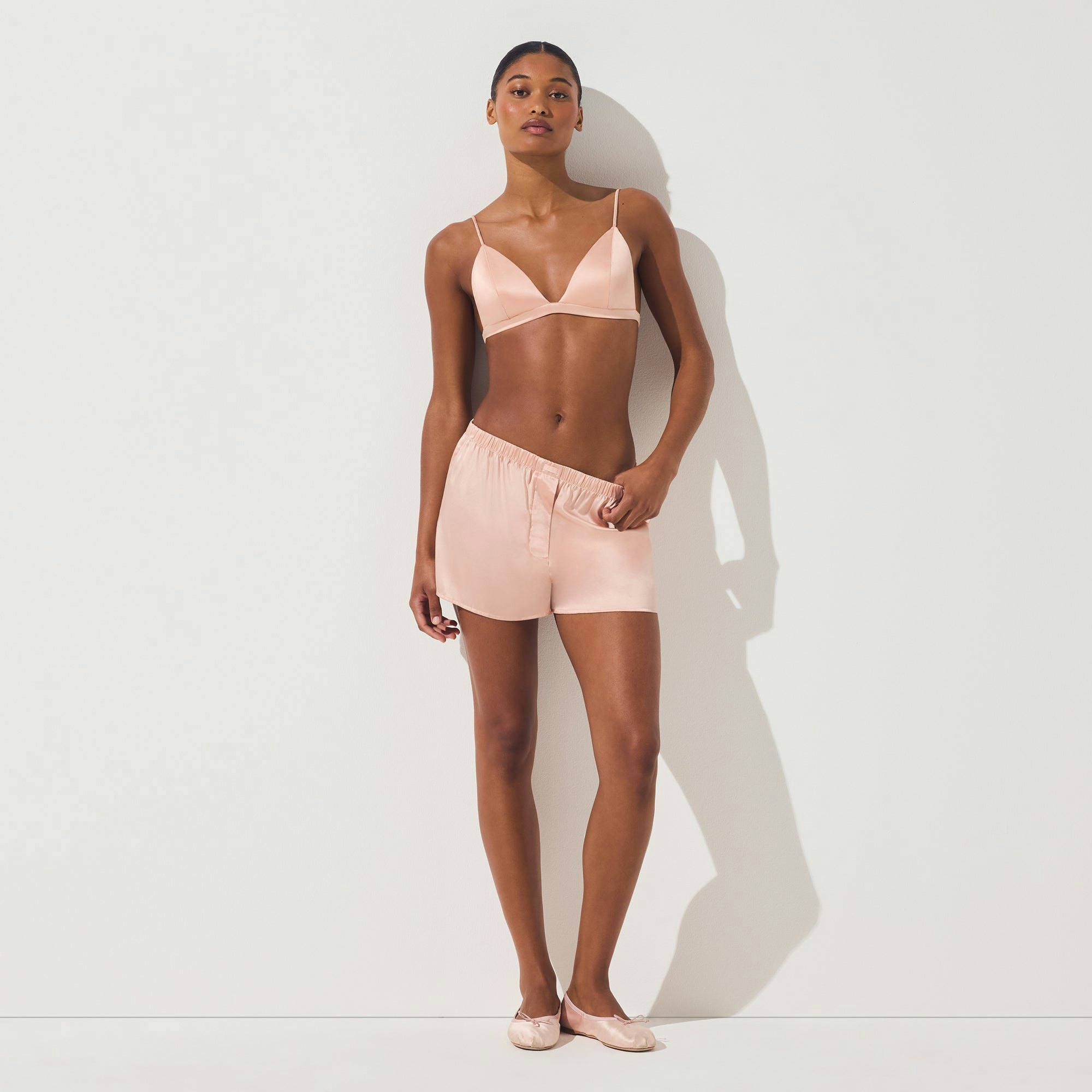 SILK TRIANGLE BRALETTE | VILLA ON A MODEL FRONT VIEW | FOCUS: 0.0, 1.0, 0.9