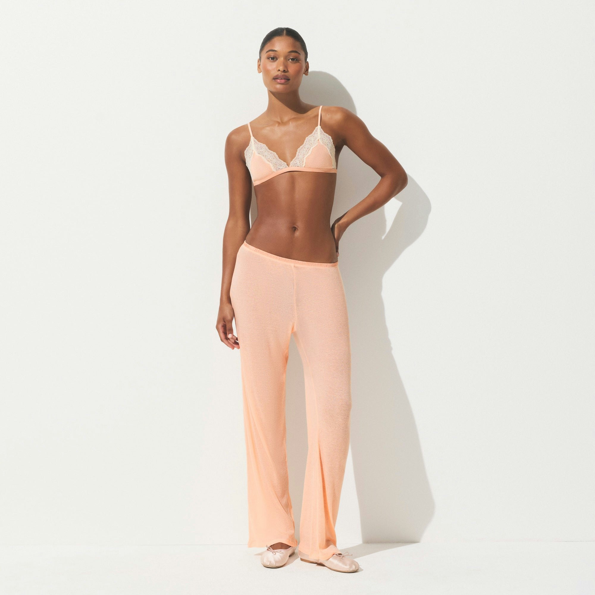 SHEER COTTON LACE TRIANGLE BRALETTE | VILLA ON A MODEL FRONT VIEW | FOCUS: 0.0, 1.0, 0.9