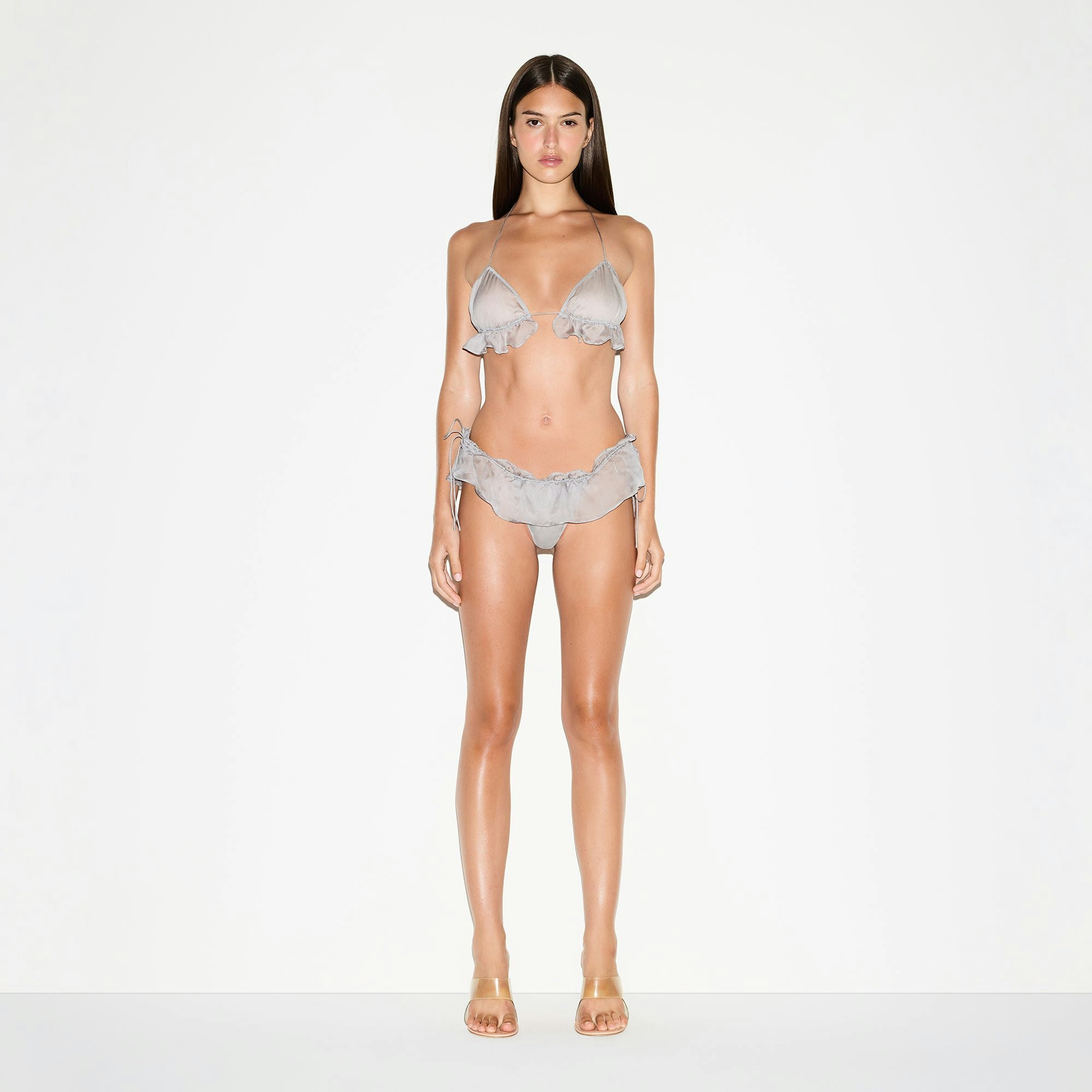 SKIMS ROMANCE TRIANGLE BRALETTE | MIRROR ON A MODEL FRONT VIEW