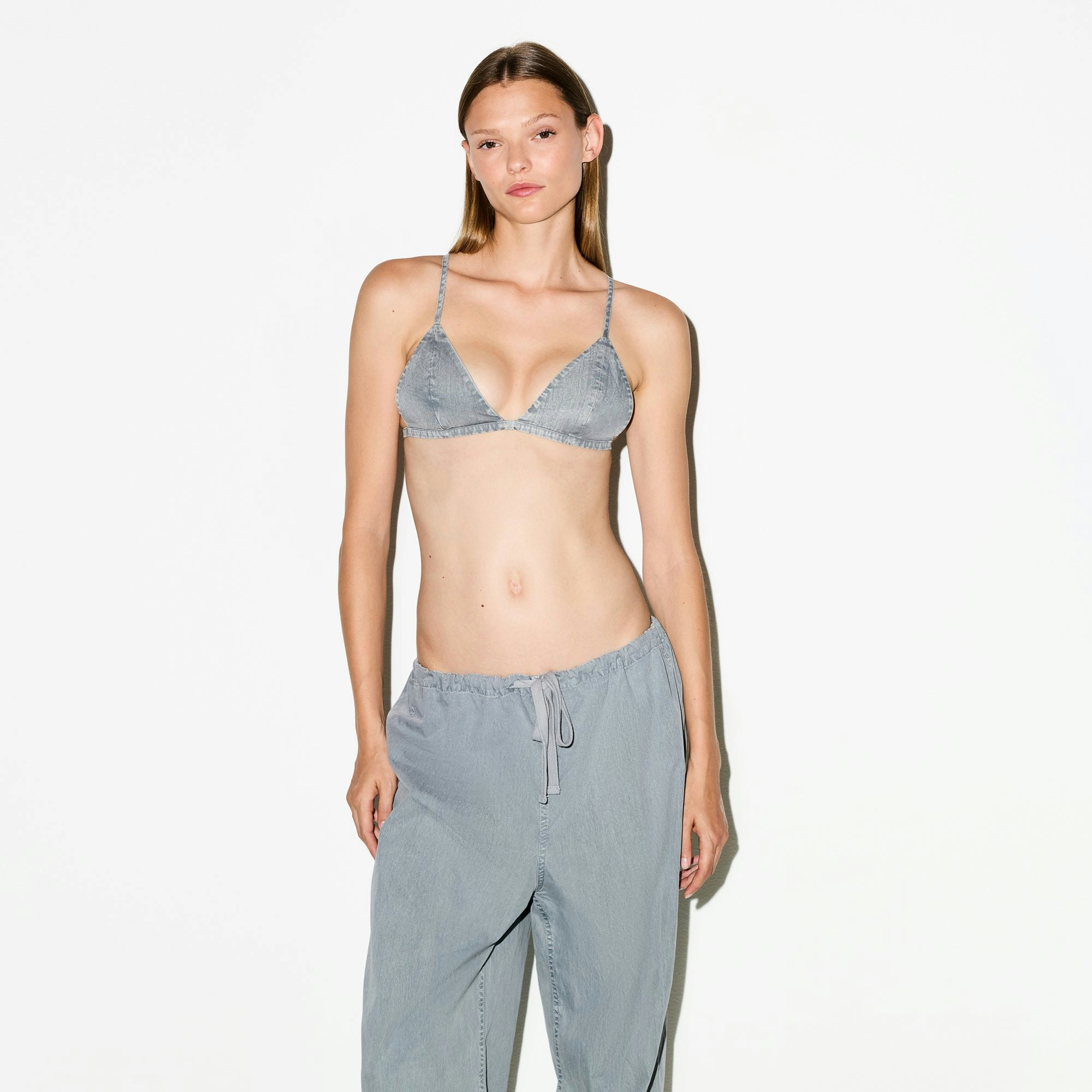 WOVEN LOUNGE TRIANGLE BRALETTE | PACIFIC ON A MODEL SIDE VIEW @ | FOCUS: 0.0, 1.0, 0.9
