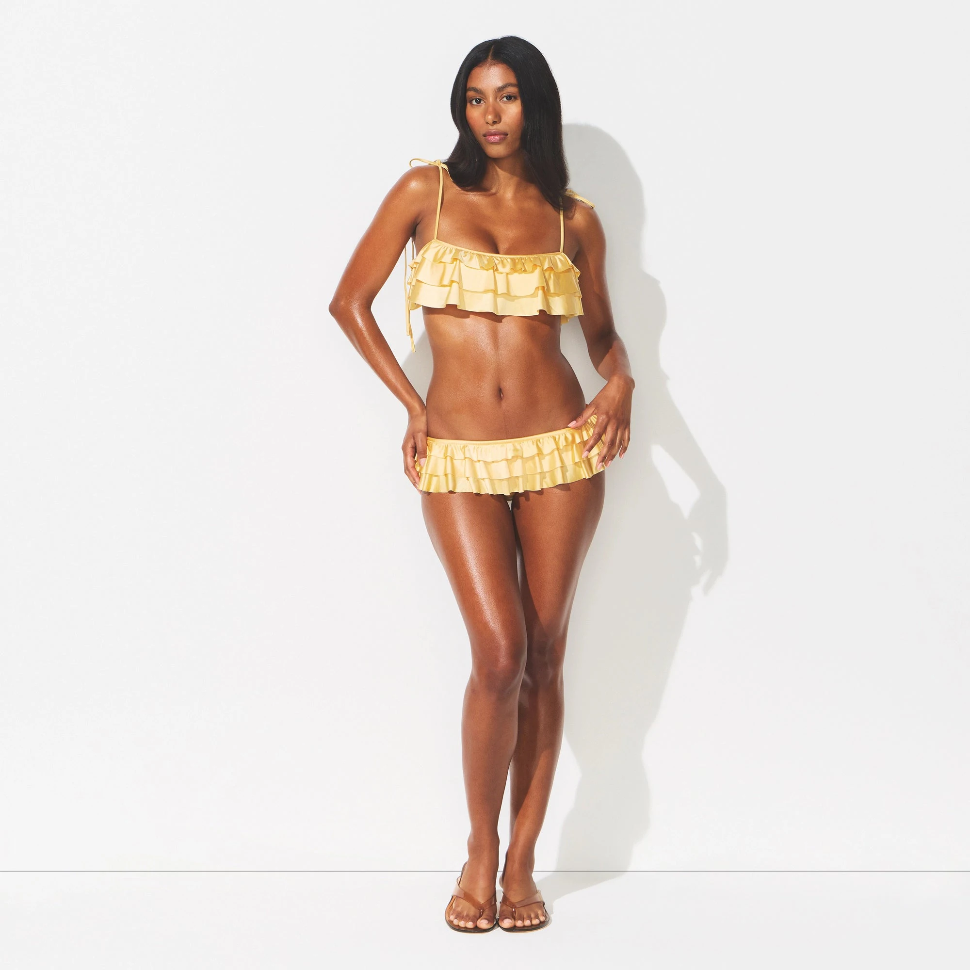 SATIN SWIM RUFFLE BIKINI TOP | MARZIPAN ON A MODEL FRONT VIEW