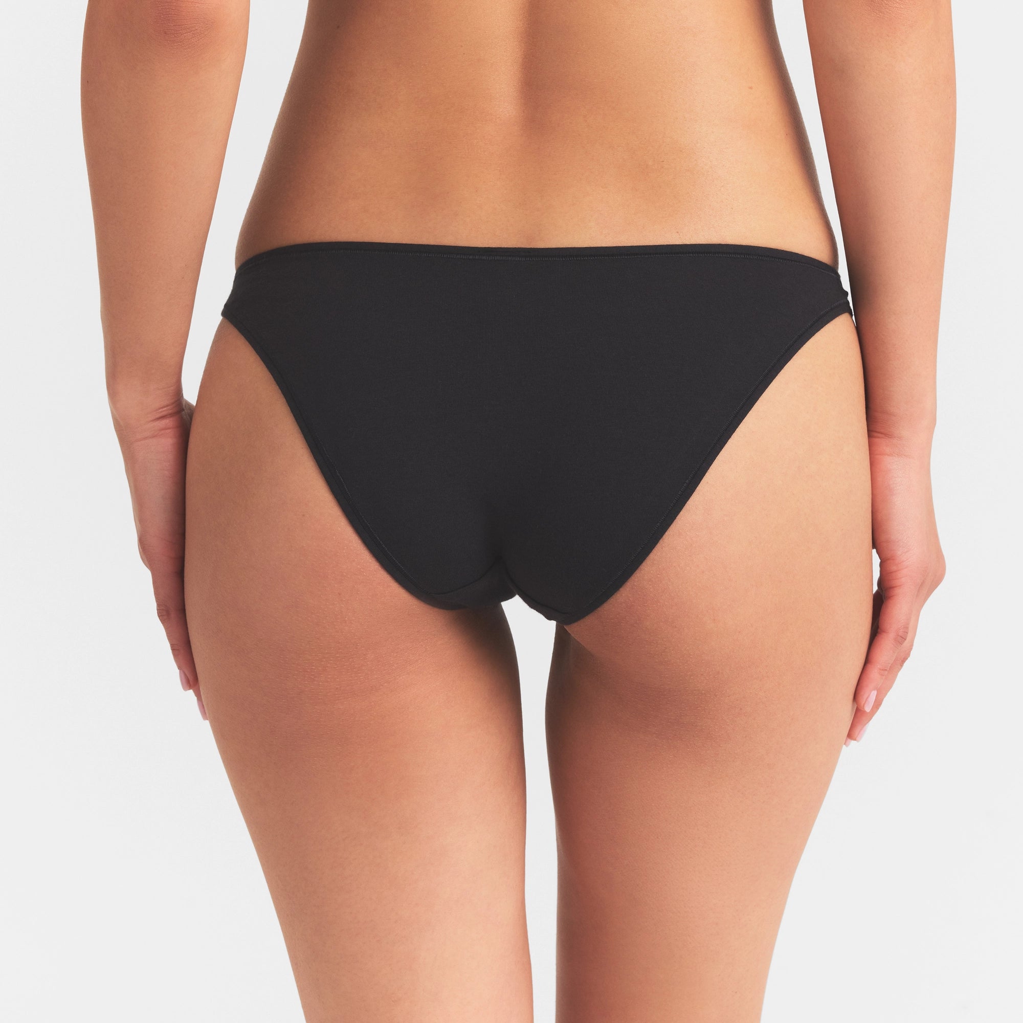 EVERYDAY COTTON BIKINI | ONYX ON A MODEL SIDE  VIEW @ | FOCUS: 0.0, 1.0, 0.9