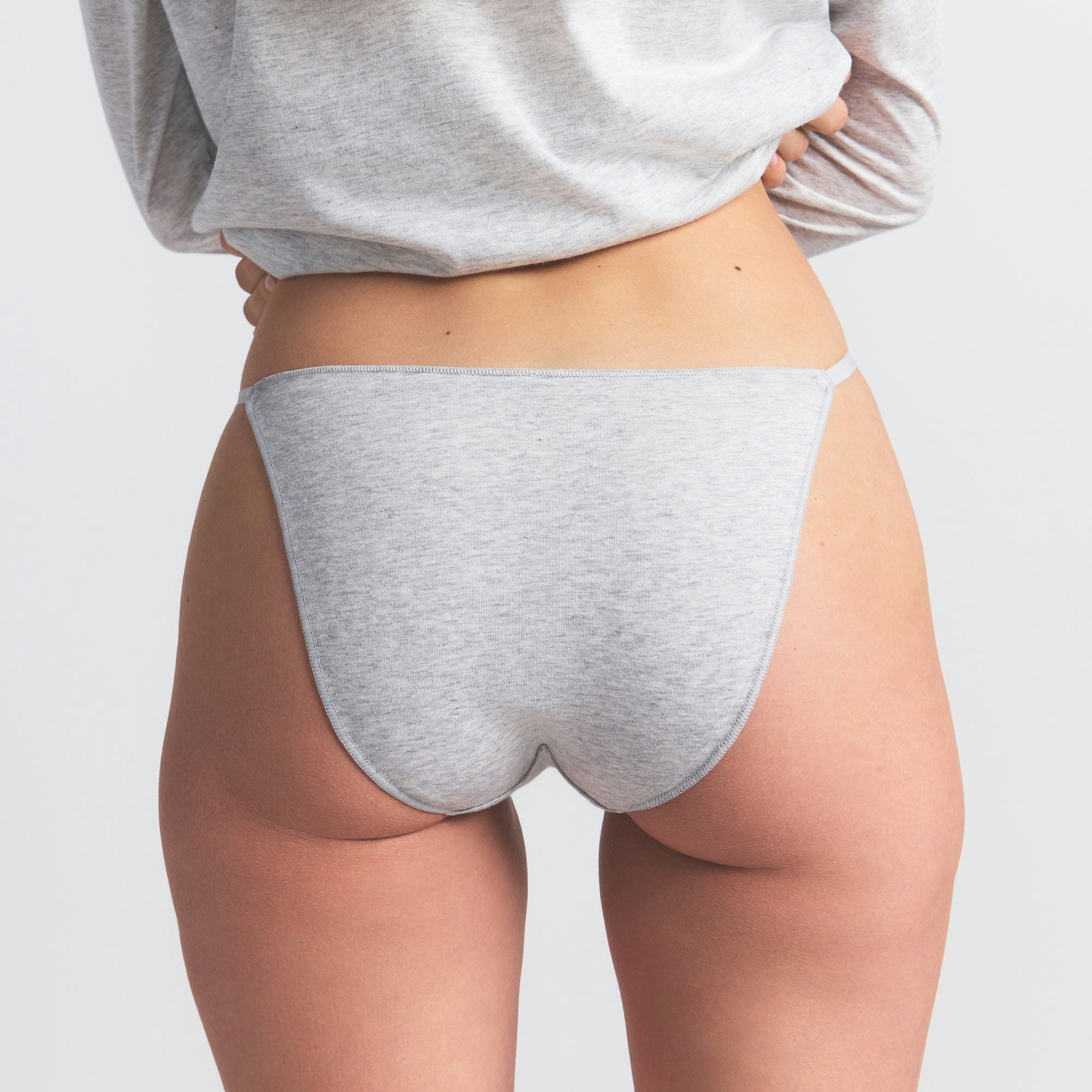 LIGHTWEIGHT COTTON BIKINI 10-PACK | HEATHER SOOT MULTI ON A MODEL BACK VIEW @ | FOCUS: 0.0, 1.0, 0.9