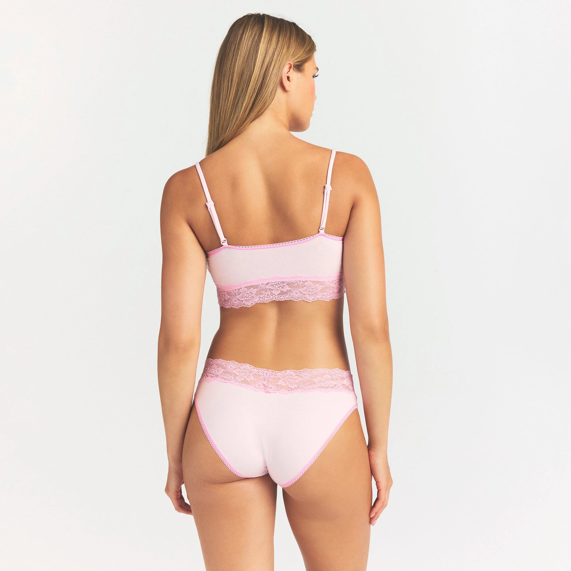 LIGHTWEIGHT COTTON WIDE LACE BRIEF | CHERRY BLOSSOM TONAL ON A MODEL SIDE VIEW @ | FOCUS: 0.0, 1.0, 0.9