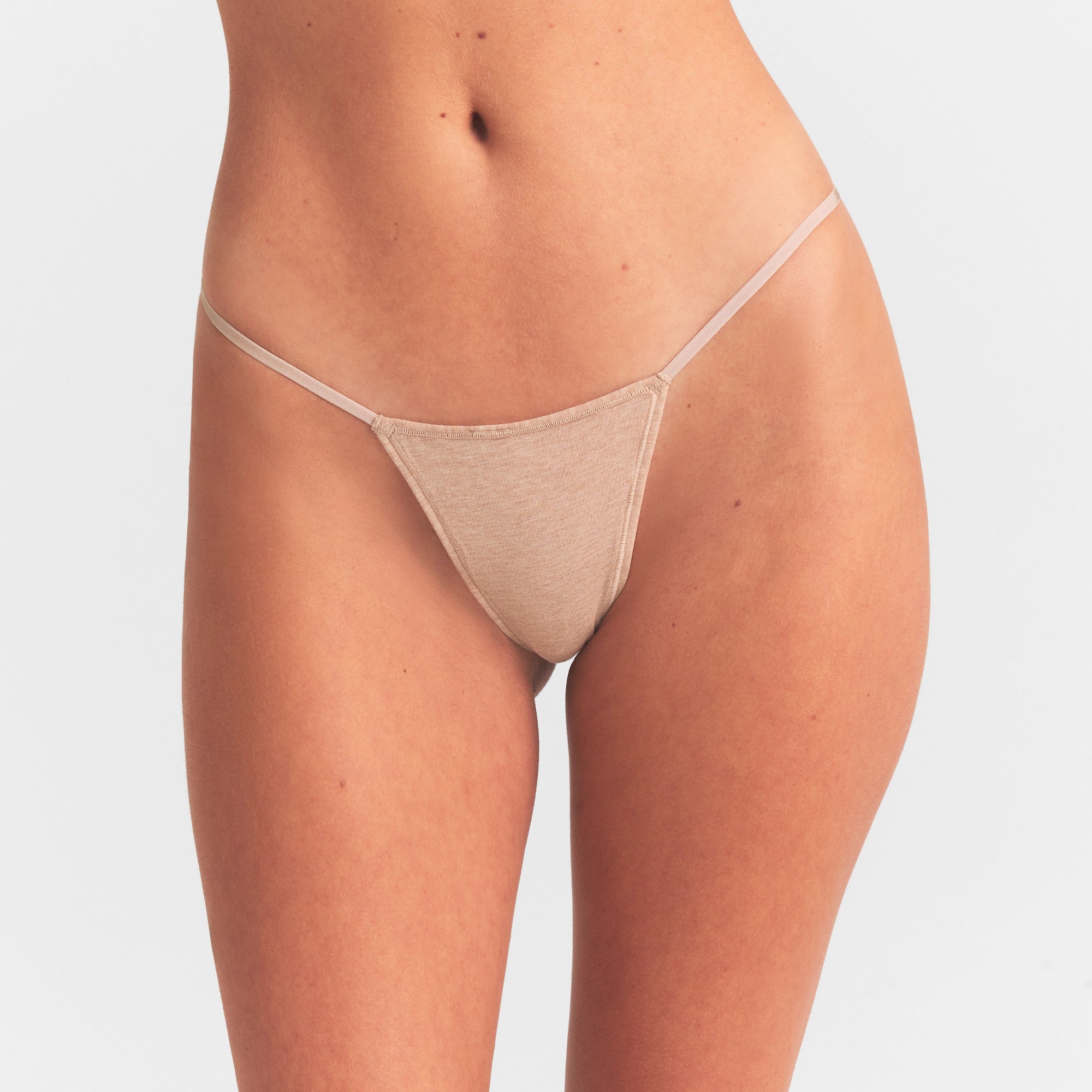 EVERYDAY COTTON STRING THONG | CLAY HEATHER ON A MODEL SIDE  VIEW @ | FOCUS: 0.0, 1.0, 0.9