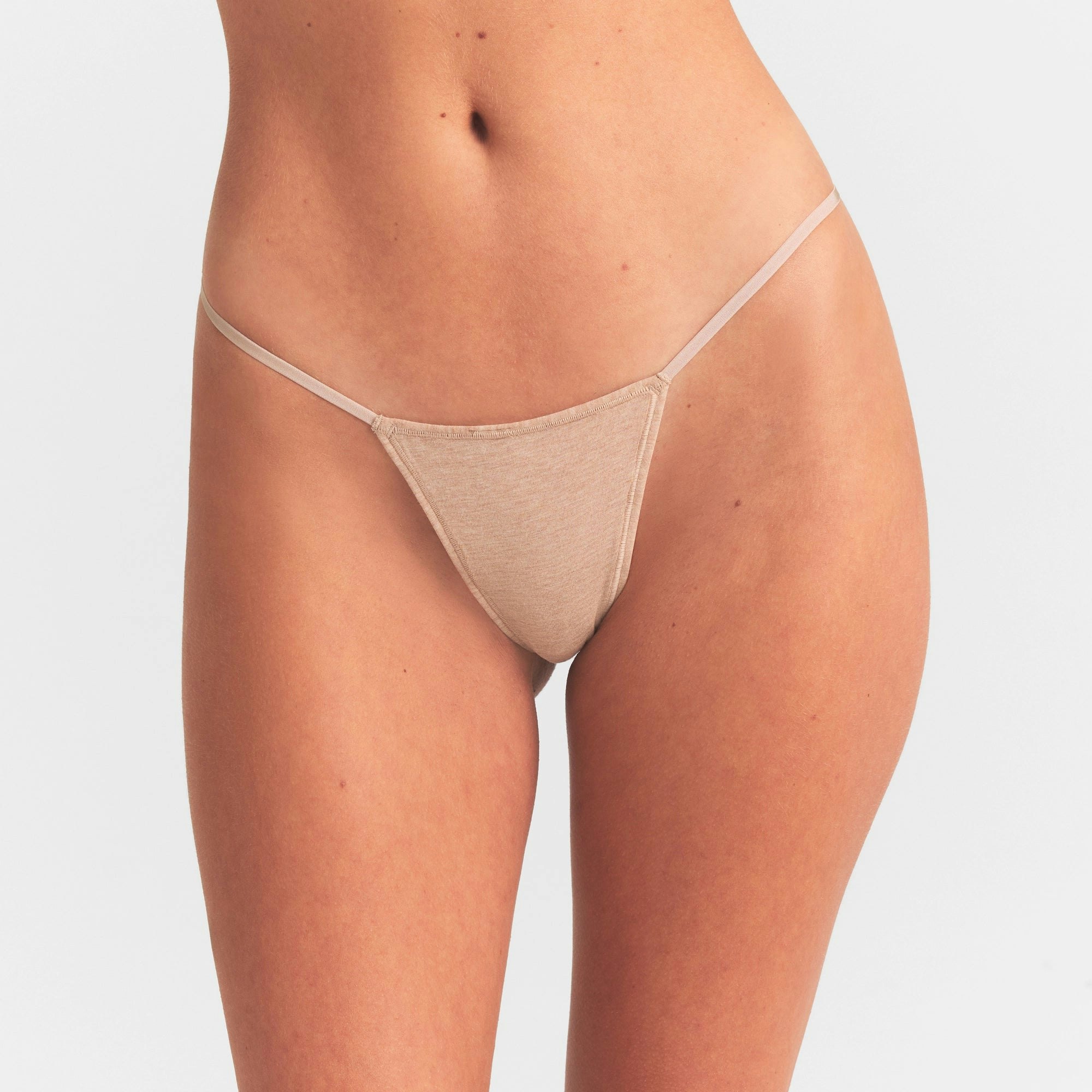 EVERYDAY COTTON STRING THONG | CLAY HEATHER ON A MODEL SIDE VIEW @ | FOCUS: 0.0, 1.0, 0.9