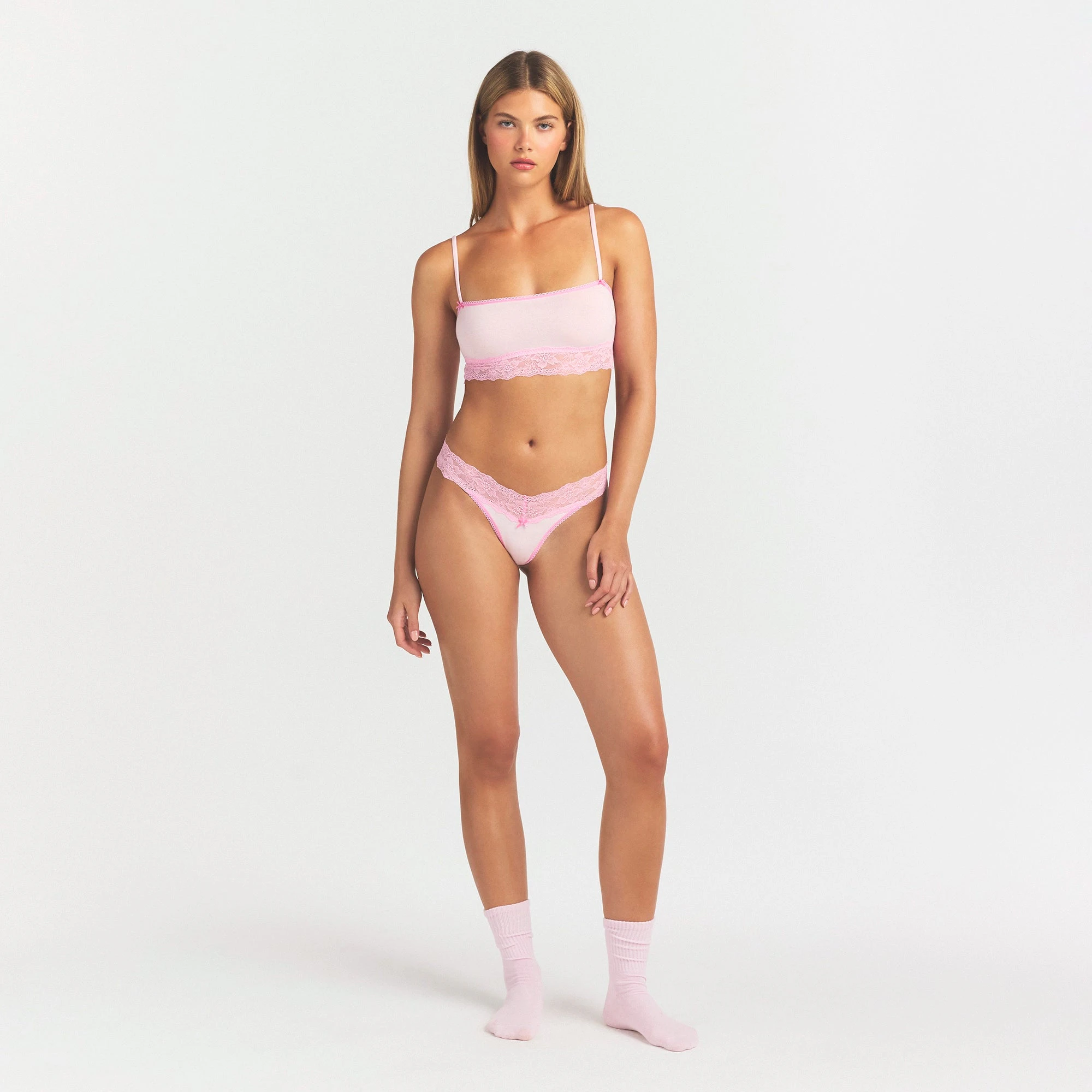 LIGHTWEIGHT COTTON WIDE LACE THONG | CHERRY BLOSSOM TONAL ON A MODEL FRONT VIEW @ | FOCUS: 0.0, 1.0, 0.9