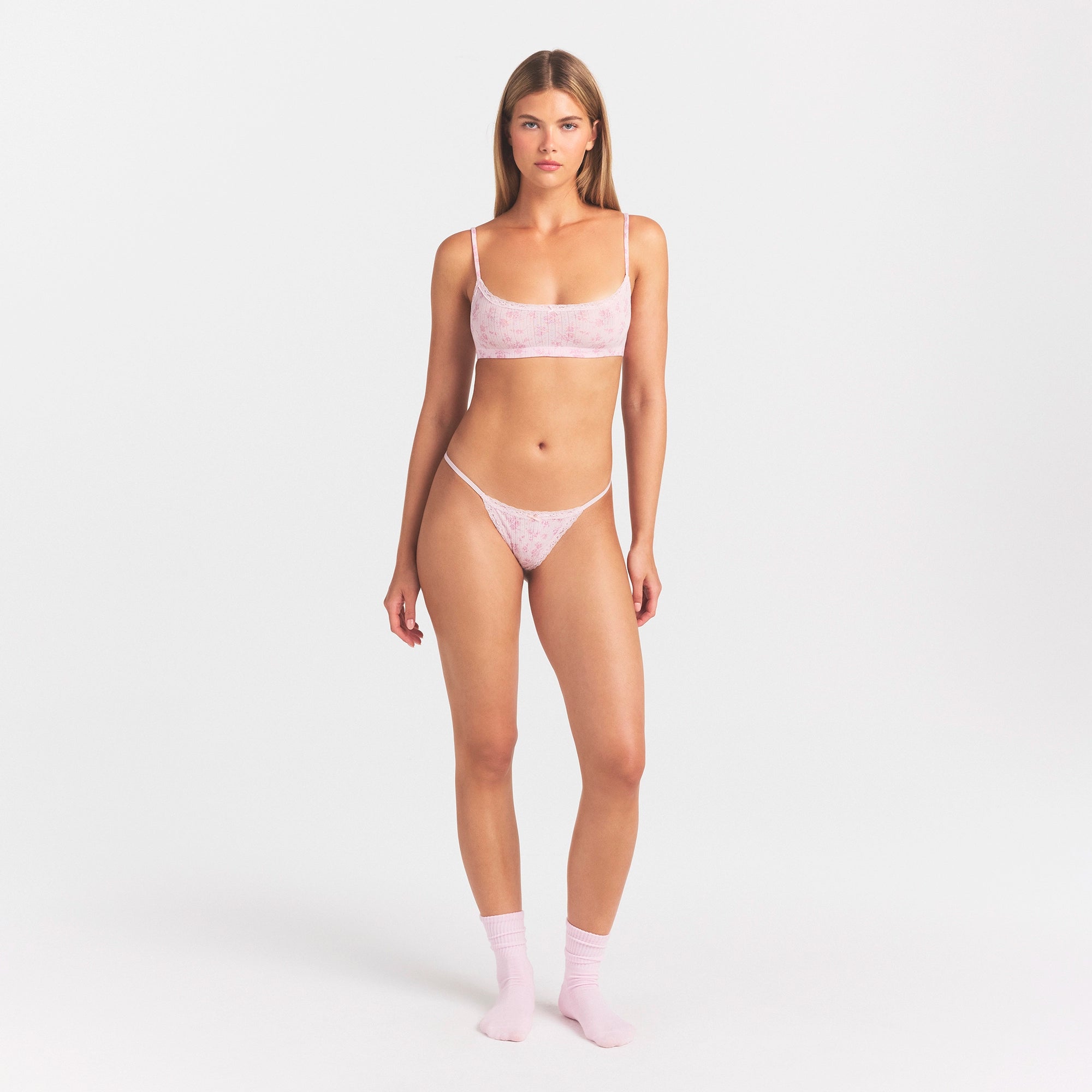 LIGHTWEIGHT COTTON POINTELLE LACE STRING THONG | BLOOM DAINTY FLORAL ON A MODEL FRONT VIEW @ | FOCUS: 0.0, 1.0, 0.9