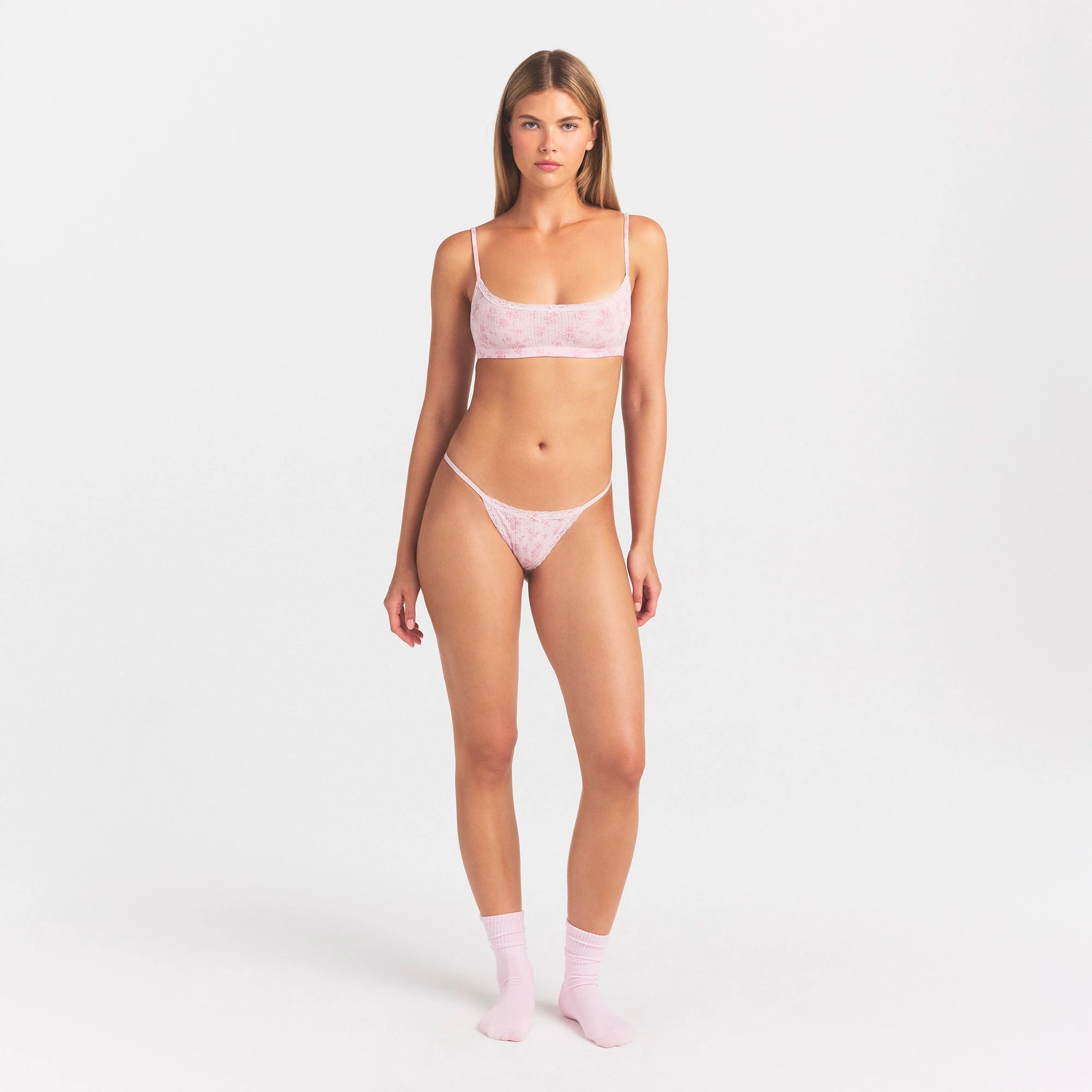 LIGHTWEIGHT COTTON POINTELLE LACE STRING THONG | BLOOM DAINTY FLORAL ON A MODEL FRONT VIEW @ | FOCUS: 0.0, 1.0, 0.9