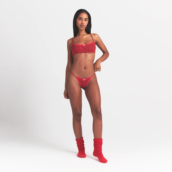 LIGHTWEIGHT COTTON POINTELLE LACE STRING THONG | BRICK HEART HALFDROP ON A MODEL FRONT VIEW @ | FOCUS: 0.0, 1.0, 0.9