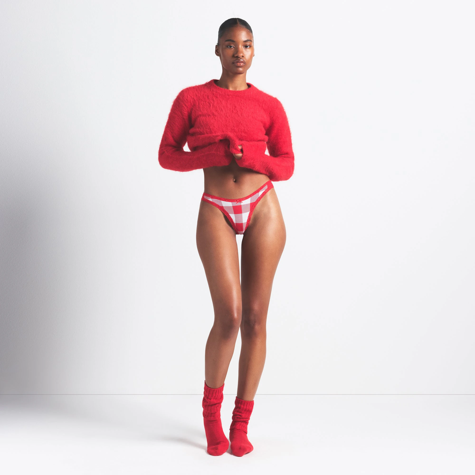 LIGHTWEIGHT COTTON LACE THONG 10-PACK | RED EMERALD MULTI ON A MODEL FRONT VIEW @ | FOCUS: 0.0, 1.0, 0.9