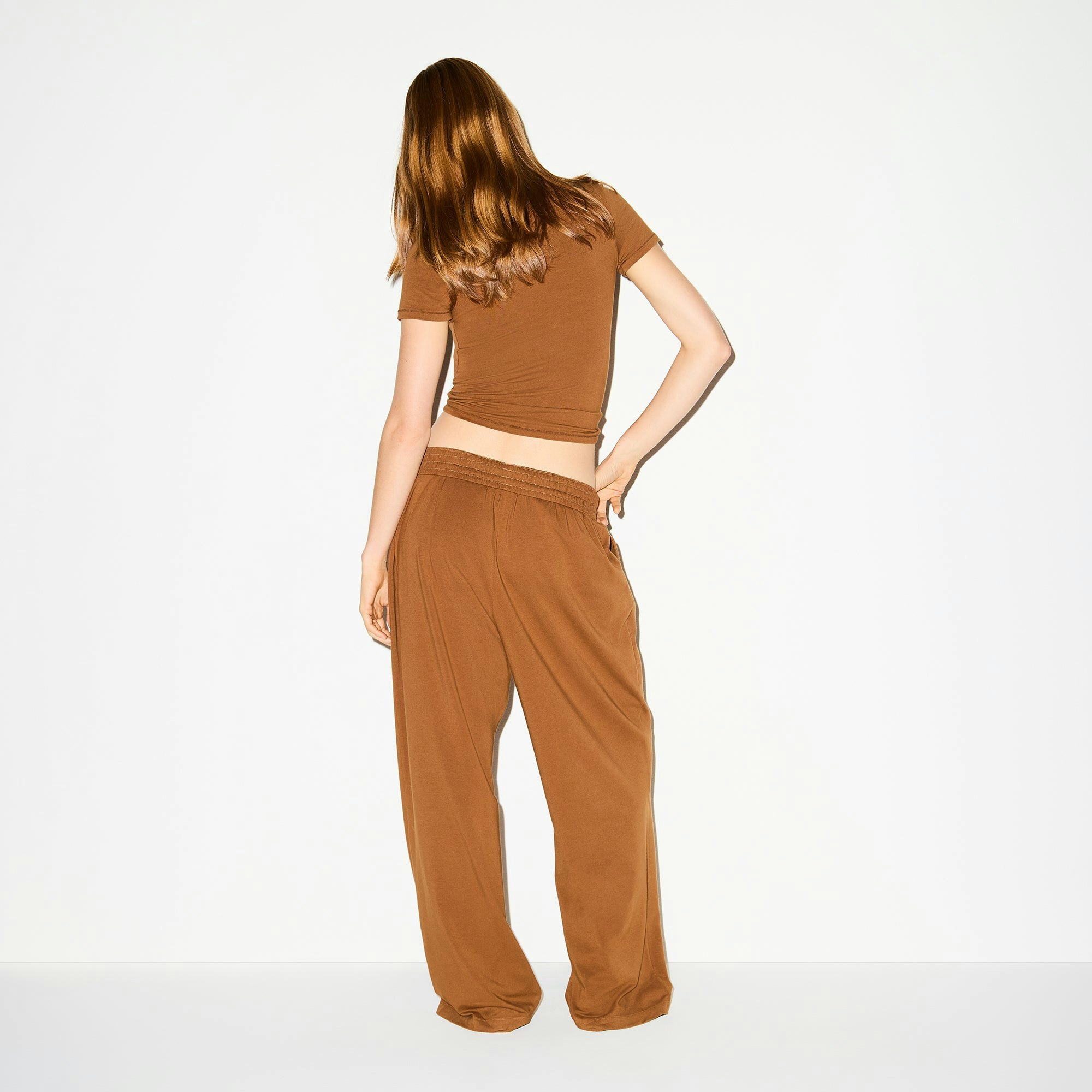 COTTON JERSEY WIDE LEG PANT | CHAI ON A MODEL BACK VIEW @ | FOCUS: 0.0, 1.0, 0.9