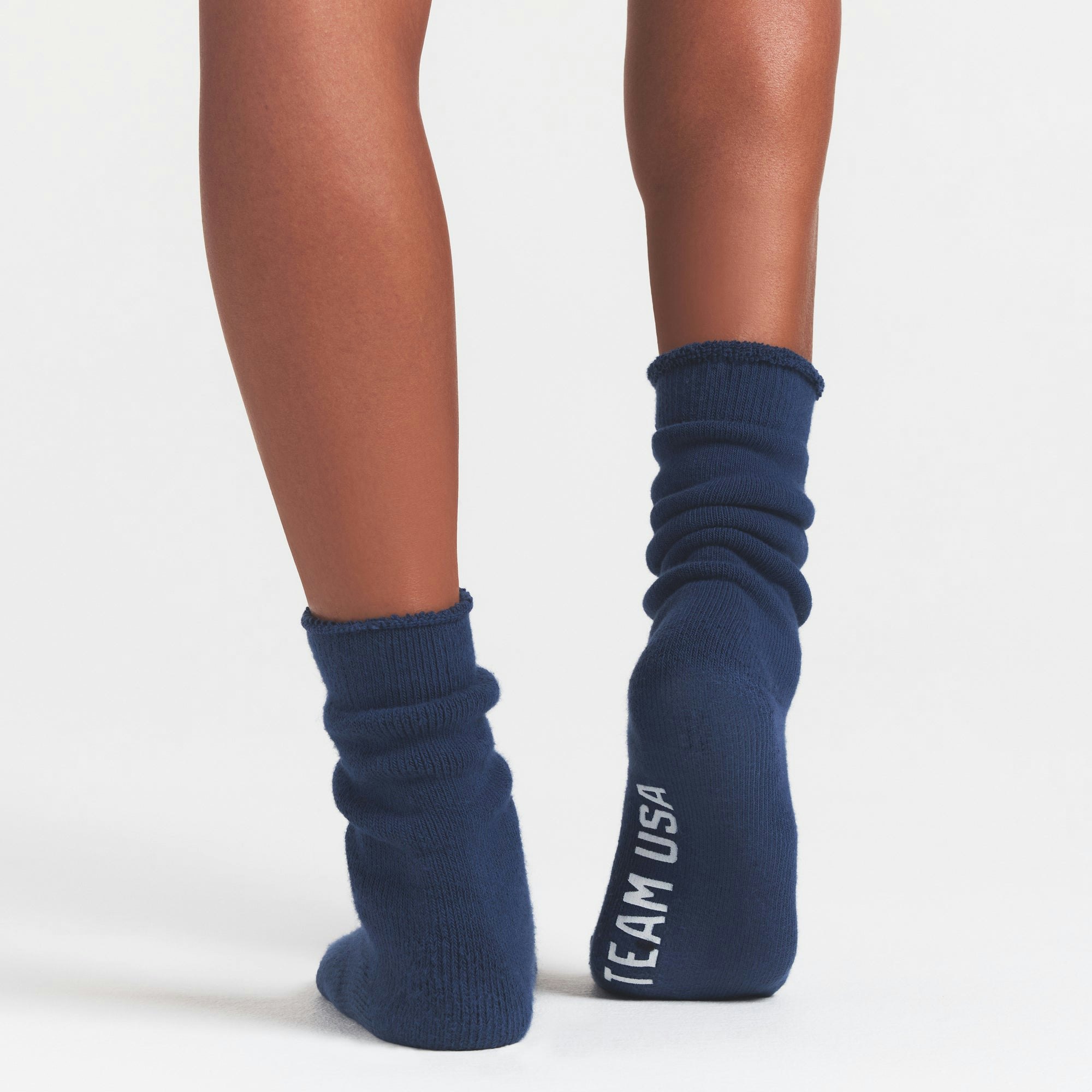 SKIMS FOR TEAM USA OLYMPIC LOUNGE SOCK | NAVYON A MODEL FRONT VIEW @ | FOCUS: 0.0, 1.0, 0.9