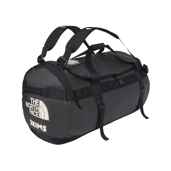 THE NORTH FACE X SKIMS LARGE BASE CAMP DUFFLE BAG | ONYX FLAT ON A WHITE BACKGROUND | FLT