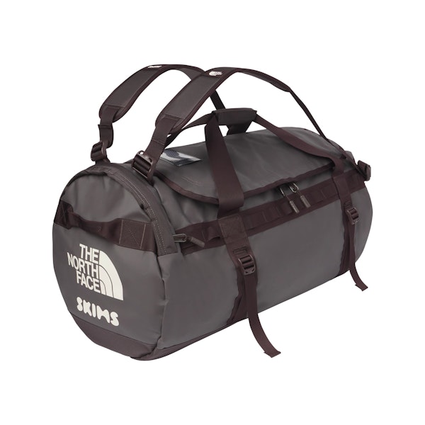 THE NORTH FACE X SKIMS LARGE BASE CAMP DUFFLE BAG | PHOENIX FLAT ON A WHITE BACKGROUND | FLT