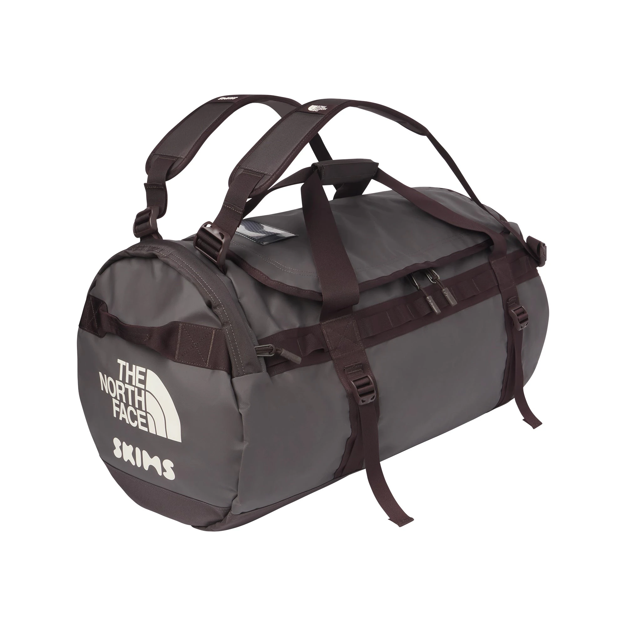 THE NORTH FACE X SKIMS LARGE BASE CAMP DUFFLE BAG | PHOENIX FLAT ON A WHITE BACKGROUND | FLT