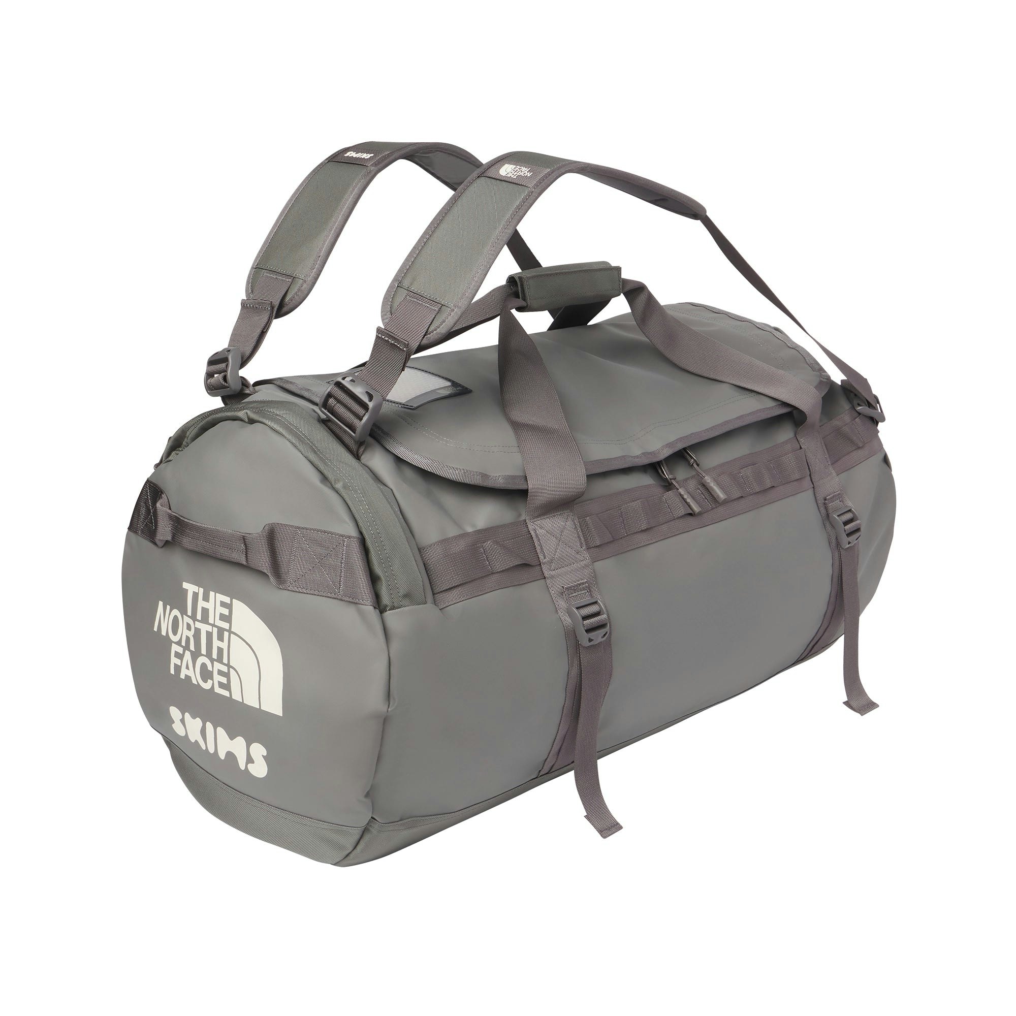 THE NORTH FACE X SKIMS LARGE BASE CAMP DUFFLE BAG | GUNMETAL FLAT ON A WHITE BACKGROUND | FLT
