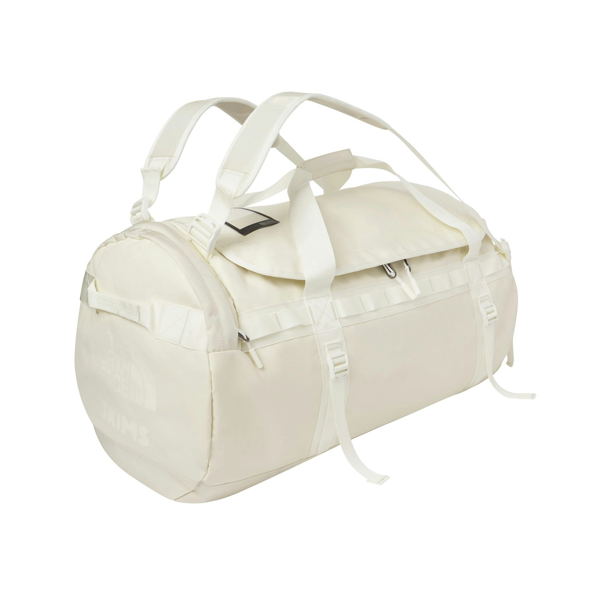 THE NORTH FACE X SKIMS LARGE BASE CAMP DUFFLE BAG | BONE FLAT ON A WHITE BACKGROUND | FLT
