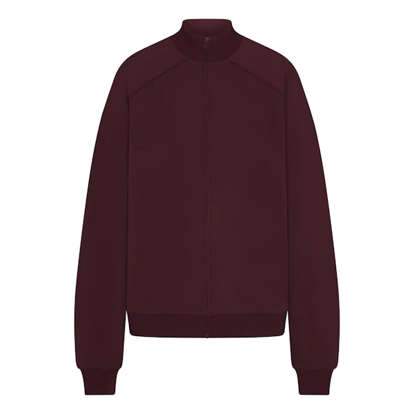 NikeSKIMS MATTE TRICOT OVERSIZED TRACK JACKET | CURRANT FLAT ON A WHITE BACKGROUND | FLT