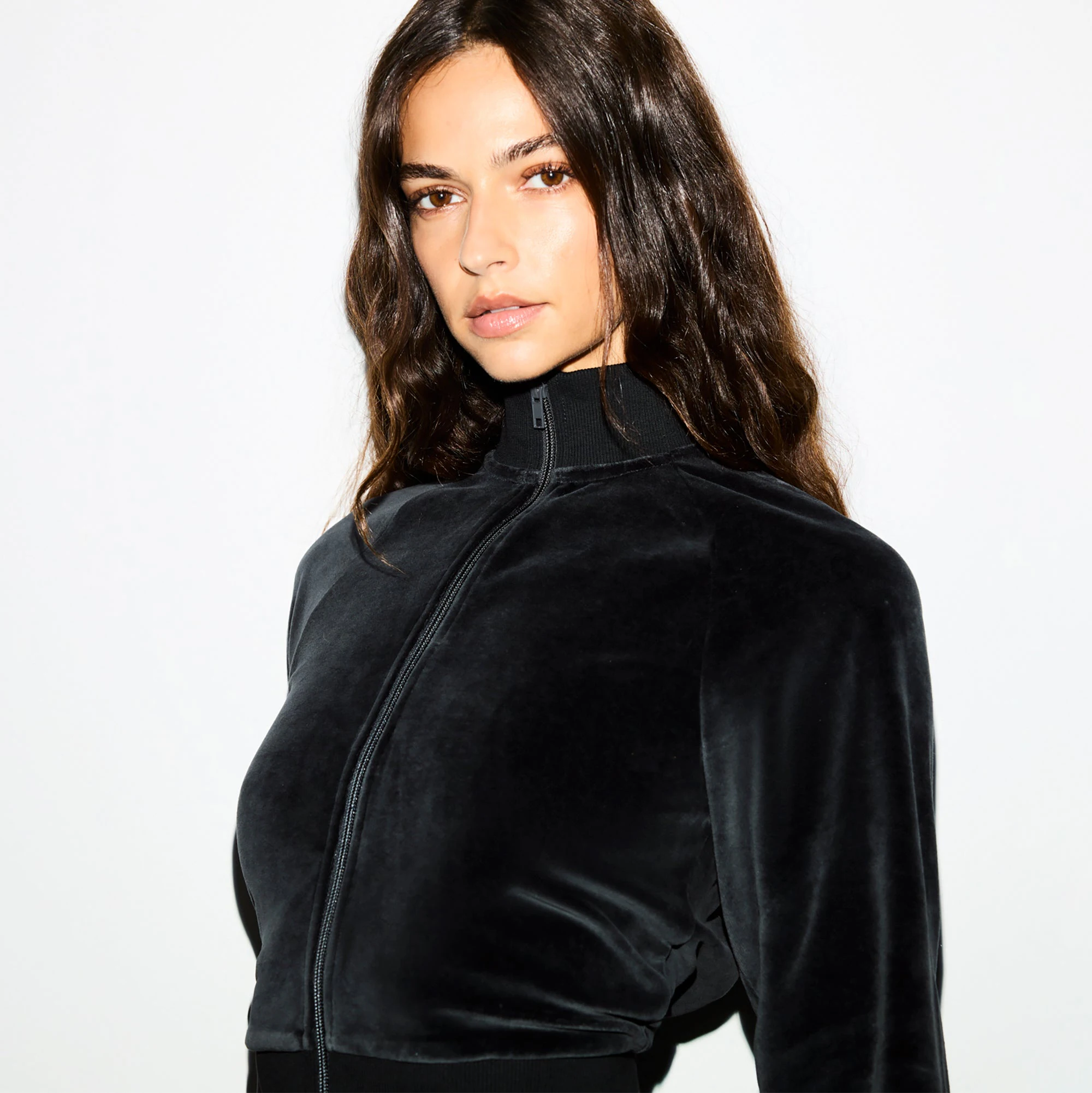 VELOUR SHRUNKEN TRACK JACKET | ONYX ON A MODEL FRONT VIEW @ | FOCUS: 0.0, 1.0, 0.9
