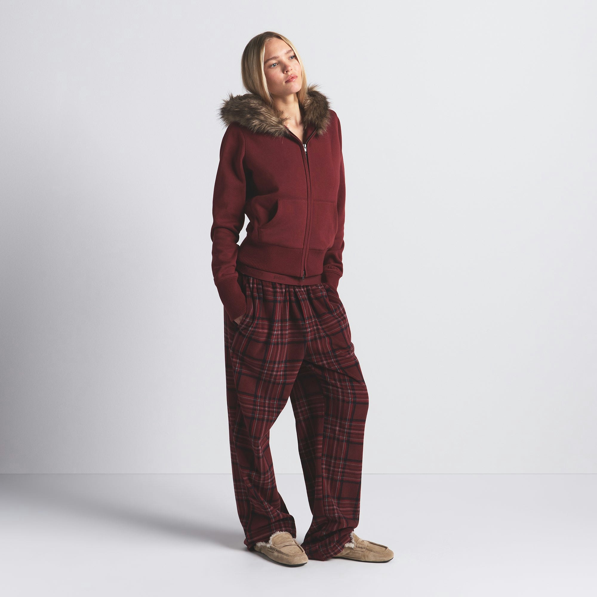 COTTON FLEECE FUR LINED ZIP UP HOODIE | MERLOT ON A MODEL SIDE VIEW @ | FOCUS: 0.0, 1.0, 0.9