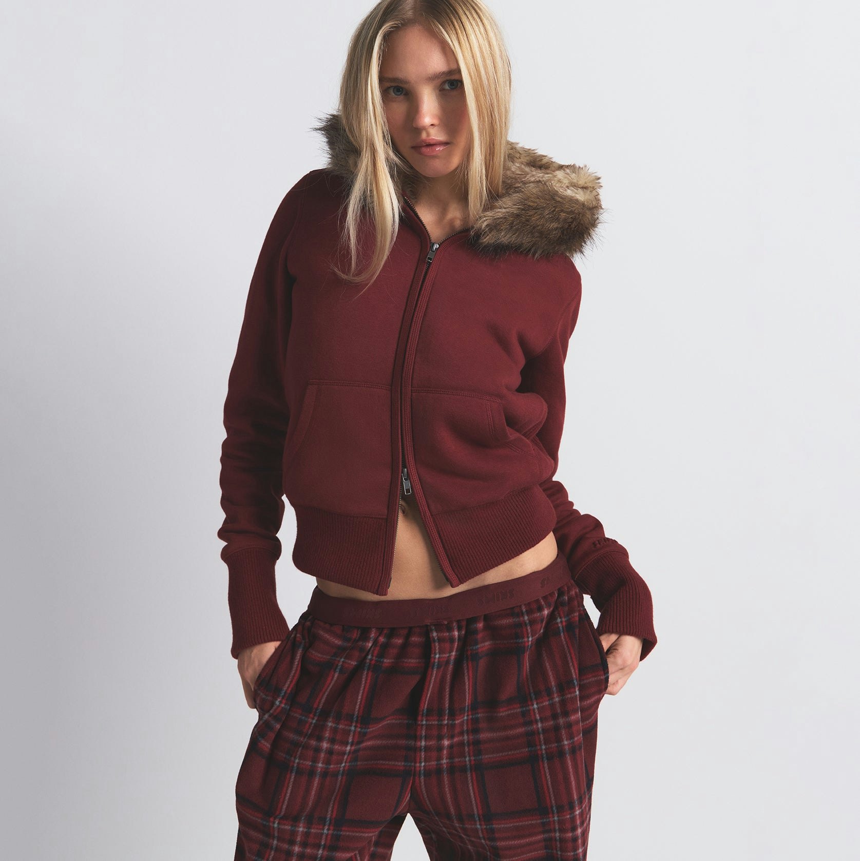 COTTON FLEECE FUR LINED ZIP UP HOODIE | MERLOT ON A MODEL FRONT VIEW @ | FOCUS: 0.0, 1.0, 0.9