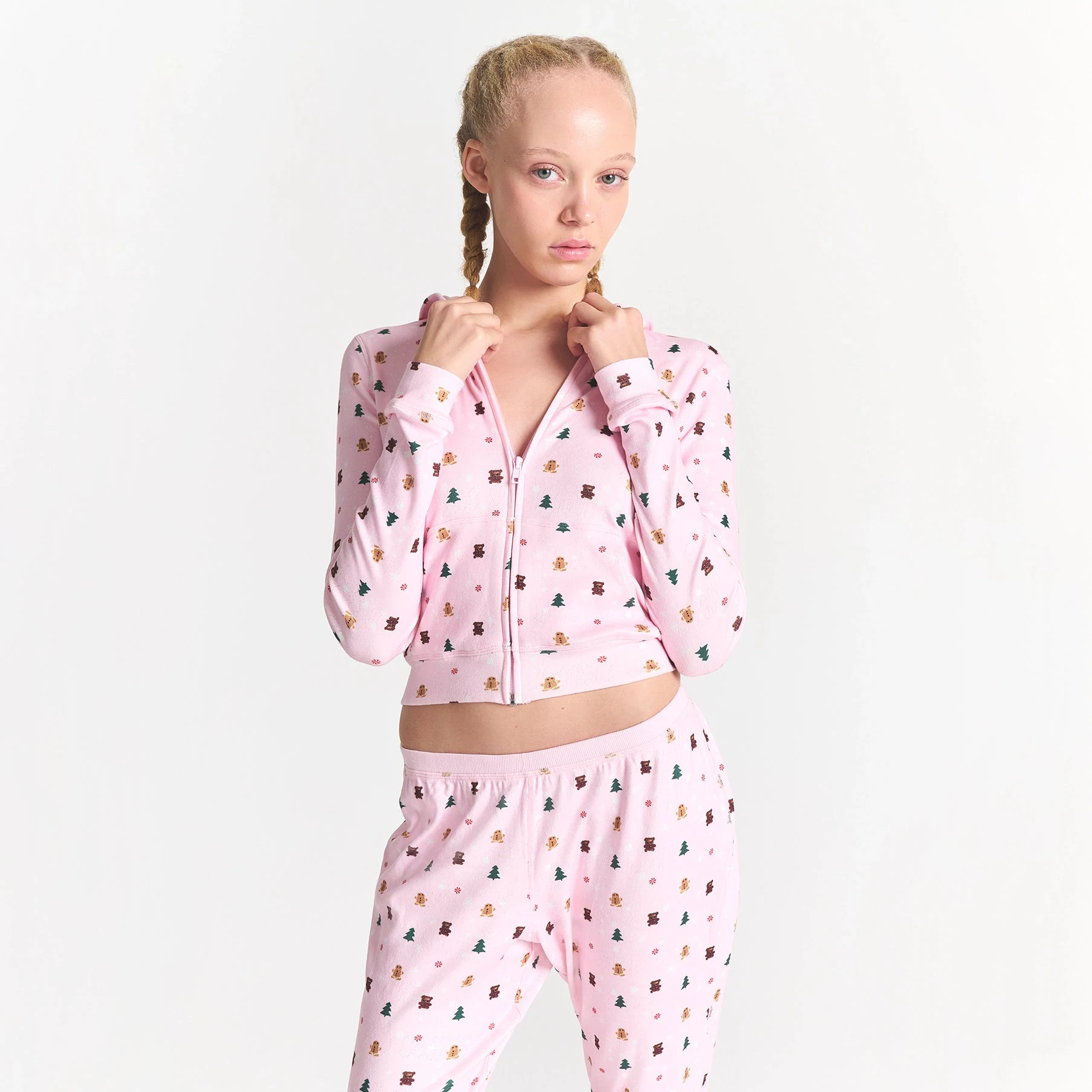 CACTUS PLANT FLEA MARKET X SKIMS PLUSH POINTELLE ZIP UP HOODIE | CHERRY BLOSSOM SNOW PRINT ON A MODEL FRONT VIEW @ | FOCUS: 0.0, 1.0, 0.9