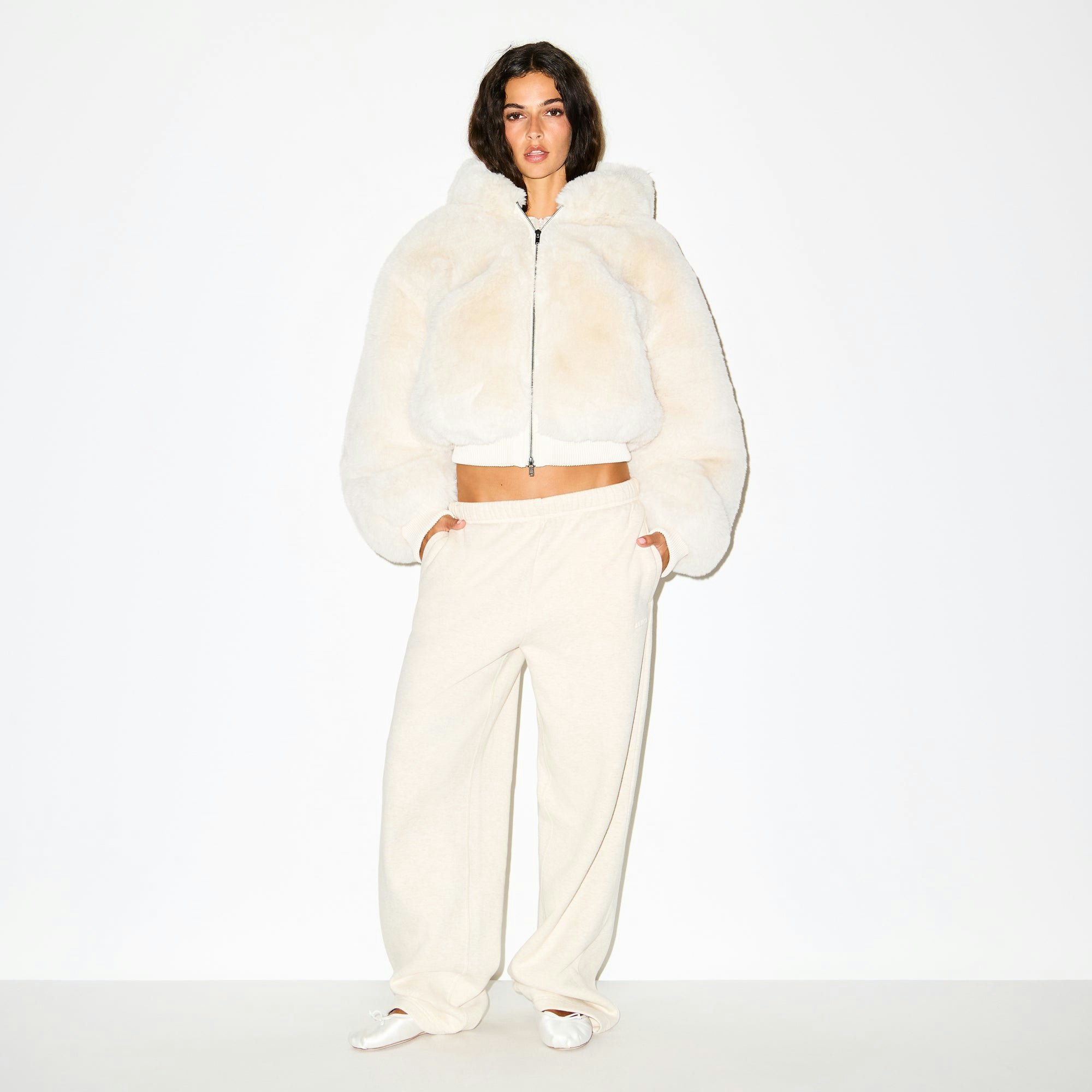 FAUX FUR ZIP UP JACKET | EGRET ON A MODEL FRONT VIEW @ | FOCUS: 0.0, 1.0, 0.9