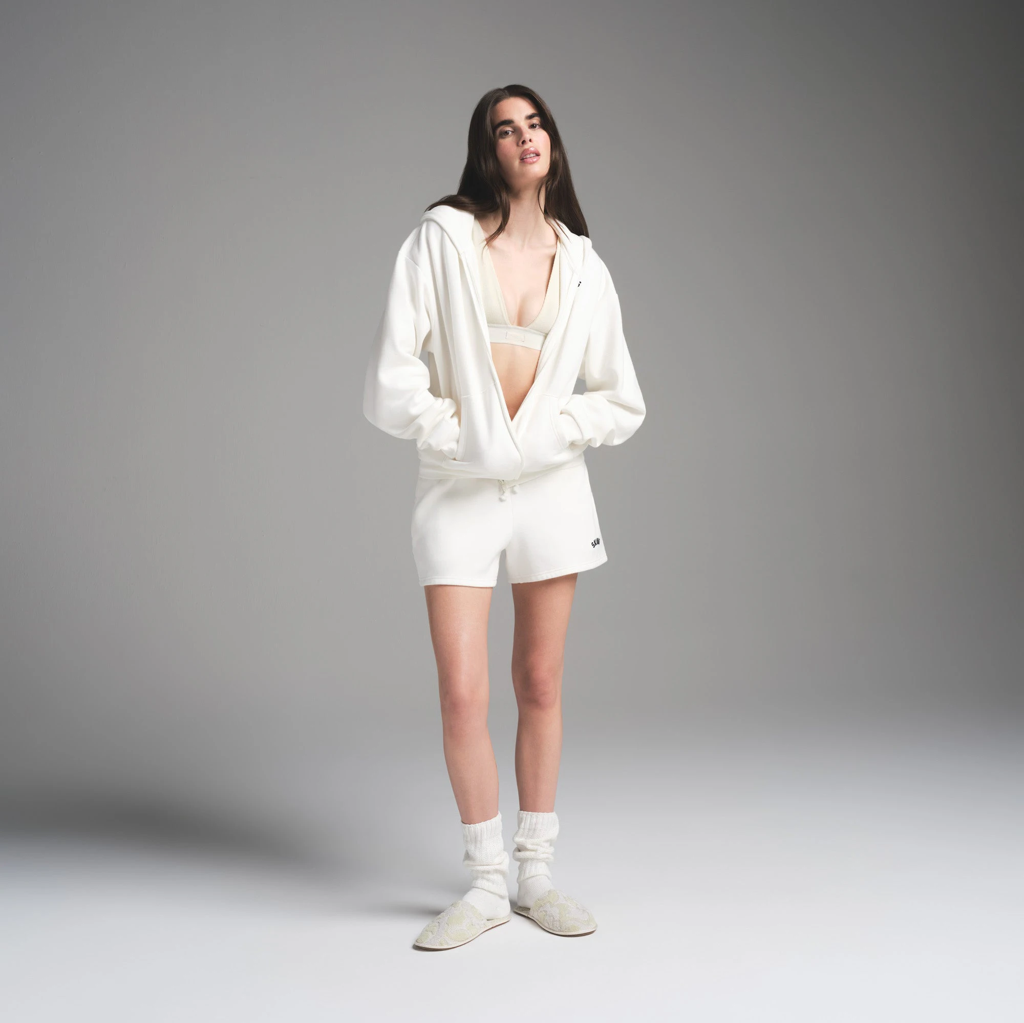 COTTON FLEECE CLASSIC ZIP UP HOODIE | MARBLE WITH GRAPHIC ON A MODEL FRONT VIEW | FOCUS: 0.0, 1.0, 0.9