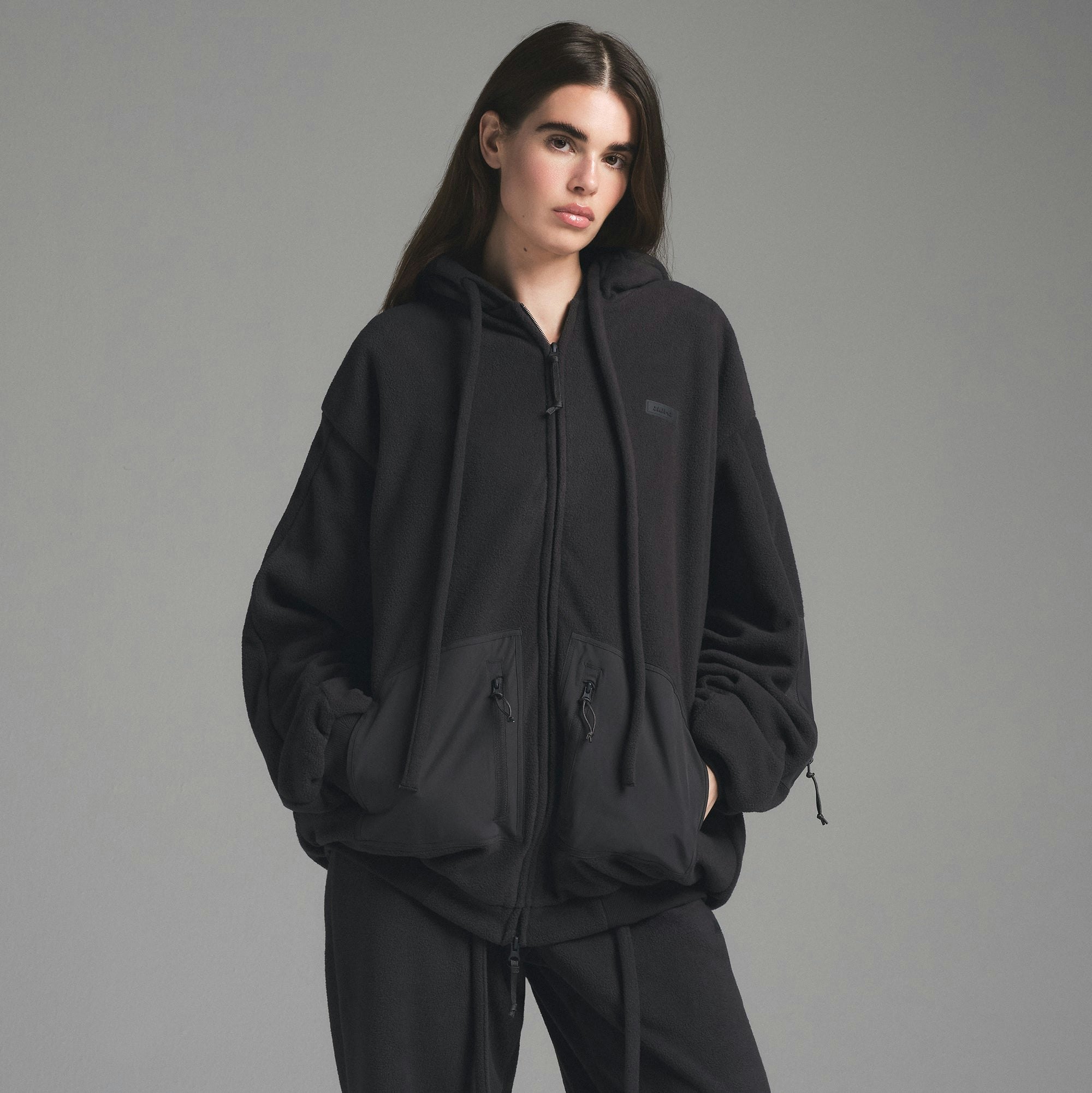 FLEECE LOUNGE OVERSIZED HOODIE | STORM ON A MODEL FRONT VIEW | FOCUS: 0.0, 1.0, 0.9