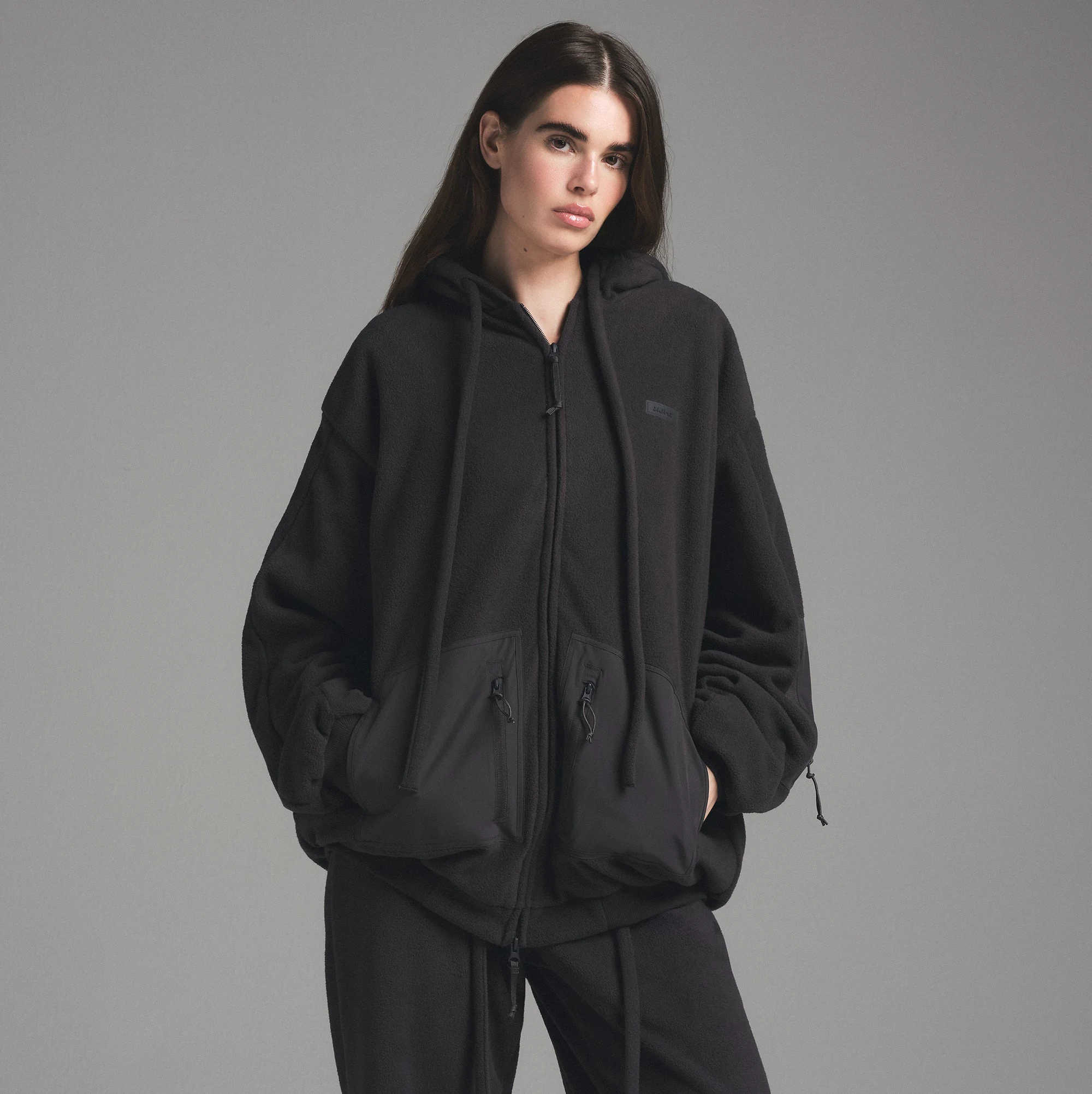 FLEECE LOUNGE OVERSIZED HOODIE | STORM ON A MODEL FRONT VIEW | FOCUS: 0.0, 1.0, 0.9