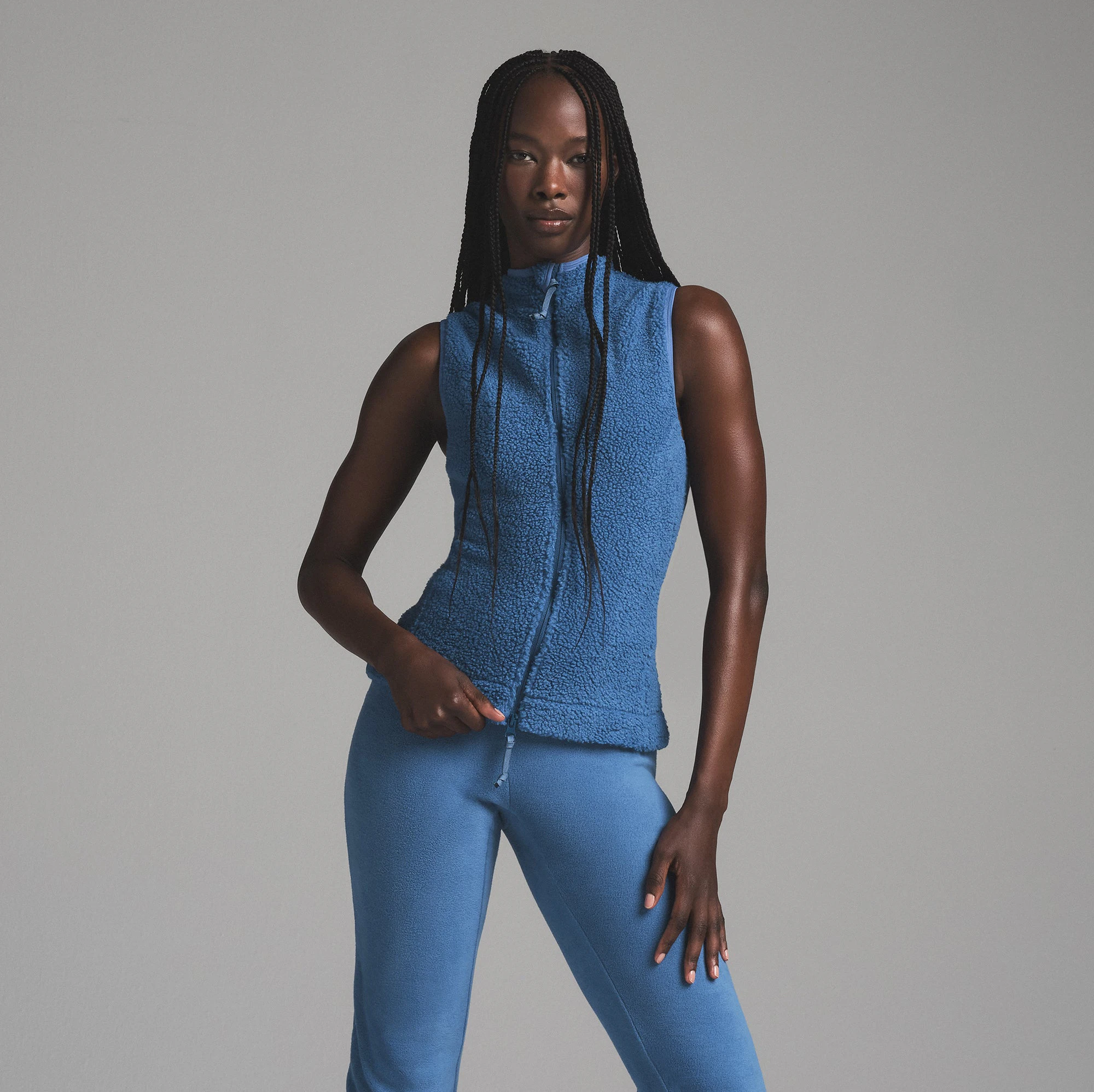 TEDDY ZIP UP VEST | AZURE ON A MODEL FRONT VIEW | FOCUS: 0.0, 1.0, 0.9