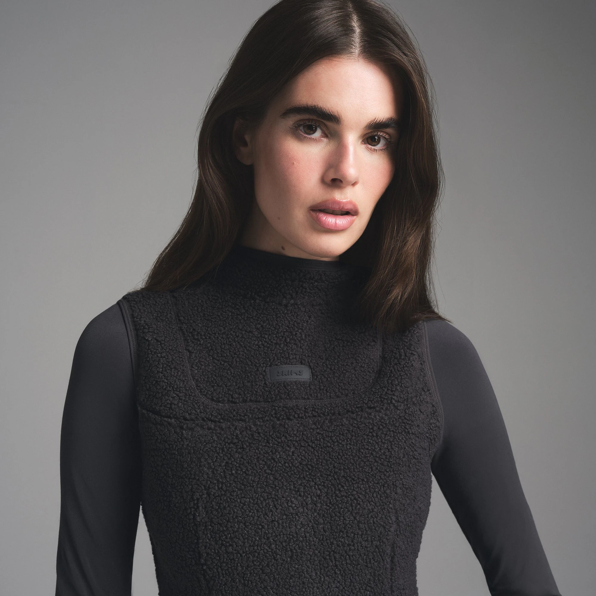 TEDDY ZIP UP VEST | STORM ON A MODEL SIDE VIEW | FOCUS: 0.0, 1.0, 0.9