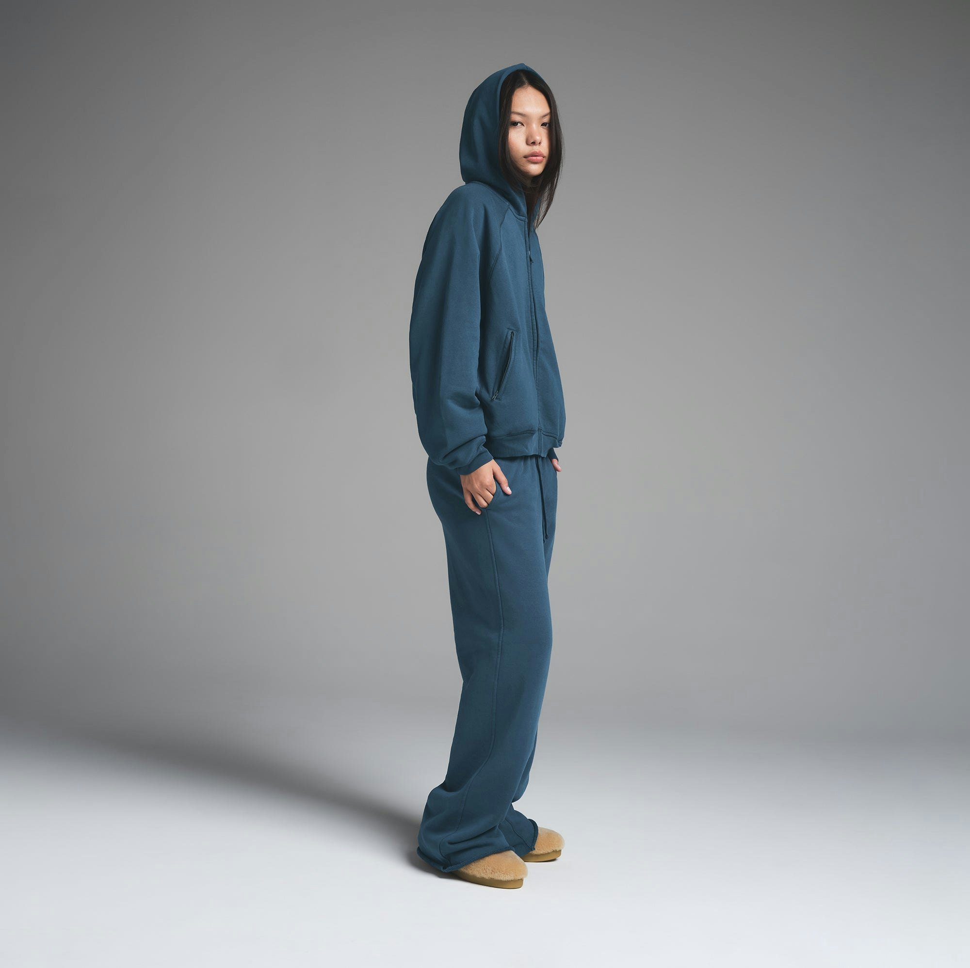 FRENCH TERRY RELAXED ZIP UP HOODIE | INDIGO ON A MODEL SIDE VIEW | FOCUS: 0.0, 1.0, 0.9