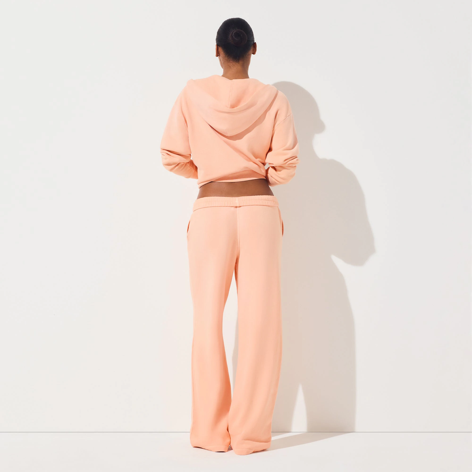 FRENCH TERRY ZIP UP HOODIE | CANTALOUPE ON A MODEL FRONT VIEW | FOCUS: 0.0, 1.0, 0.9