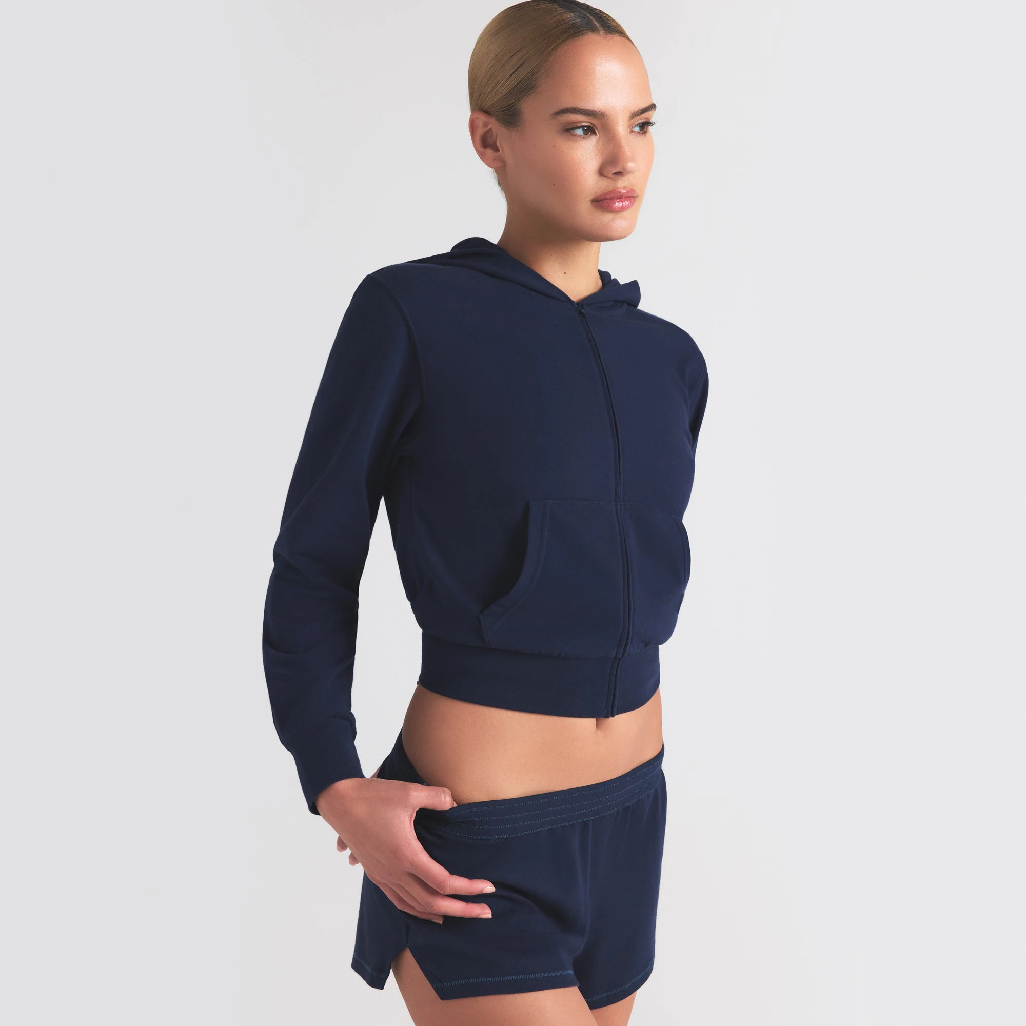 COTTON JERSEY ZIP UP HOODIE | NAVY ON A MODEL SIDE VIEW | FOCUS: 0.0, 1.0, 0.9