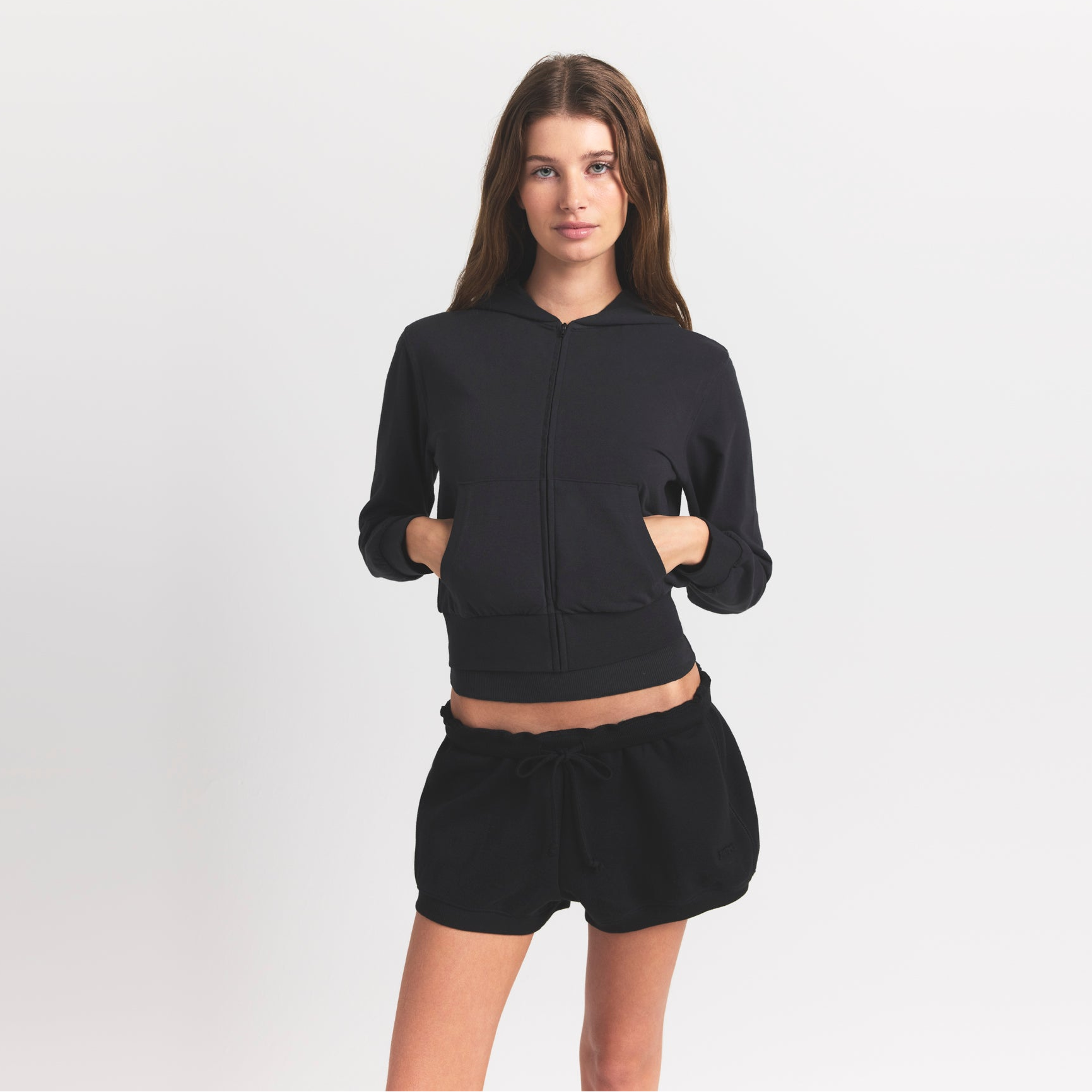 COTTON JERSEY ZIP UP HOODIE | SOOT ON A MODEL FRONT VIEW S | FOCUS: 0.0, 1.0, 0.9