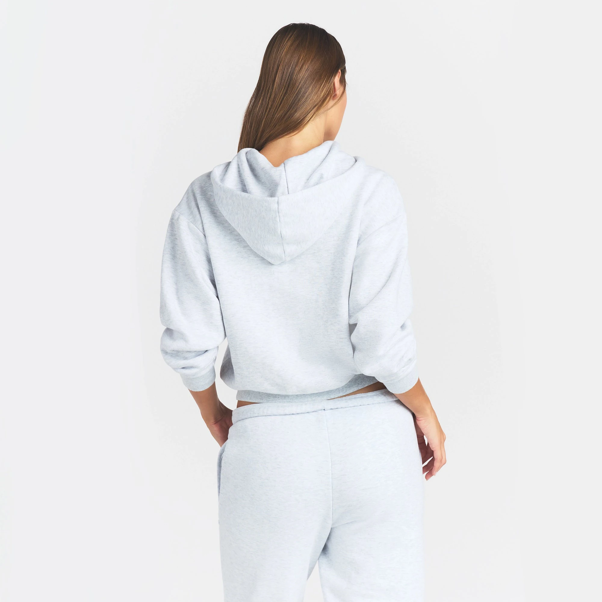COTTON FLEECE CLASSIC ZIP UP HOODIE | LIGHT HEATHER GREY ON A MODEL BACK VIEW