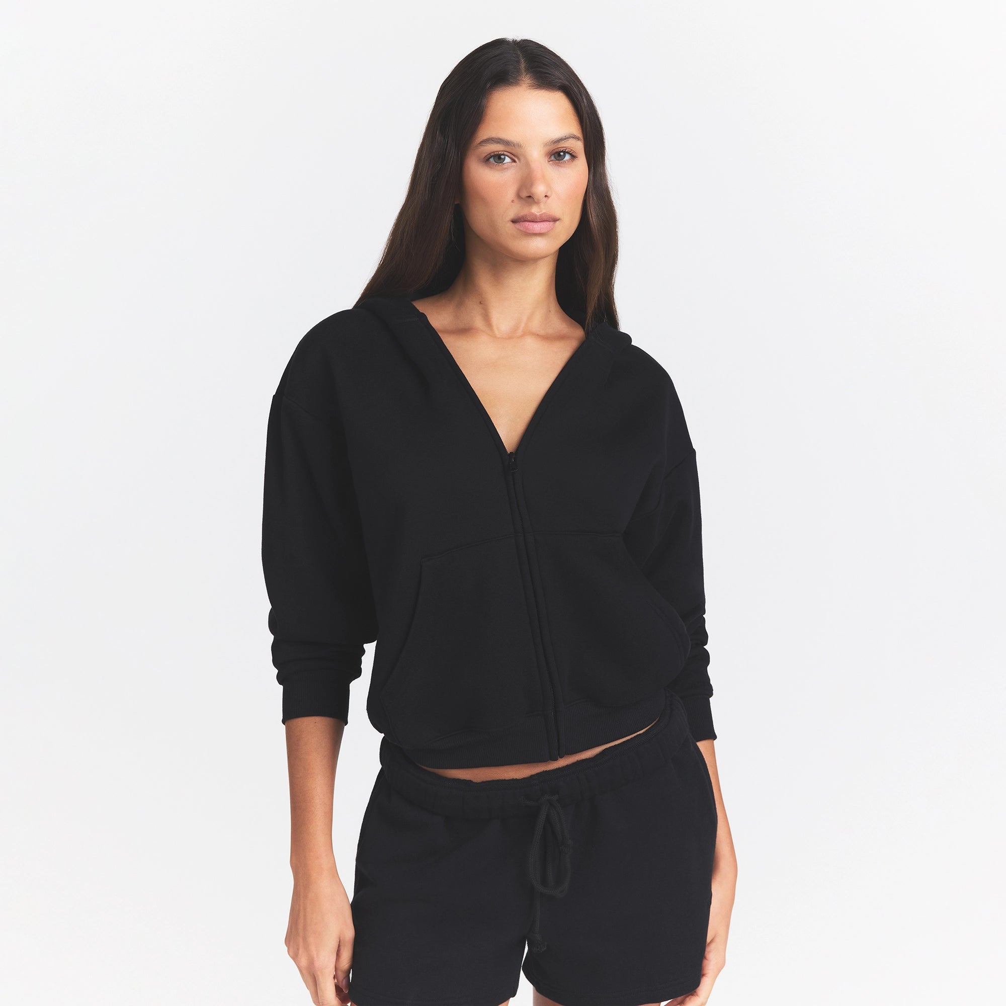 COTTON FLEECE CLASSIC ZIP UP HOODIE | ONYX ON A MODEL FRONT VIEW @ | FOCUS: 0.0, 1.0, 0.9